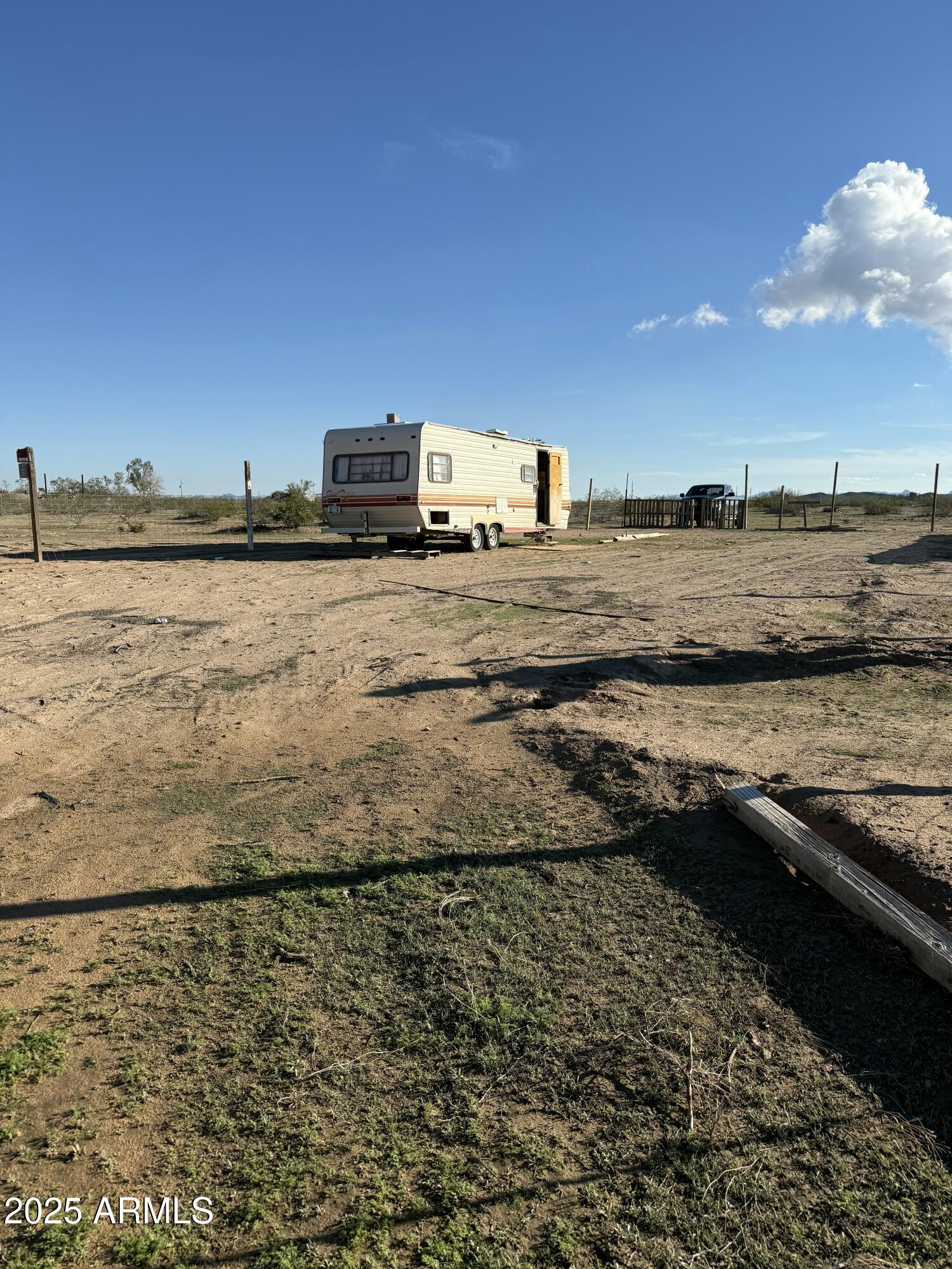 Your chance to own a small piece of land in Tonopah which is rare to offer less than an acre of land.  This property is 6,330 sq ft. Land has been cleared, posting and fencing is up.  Travel trailer to convey as is.