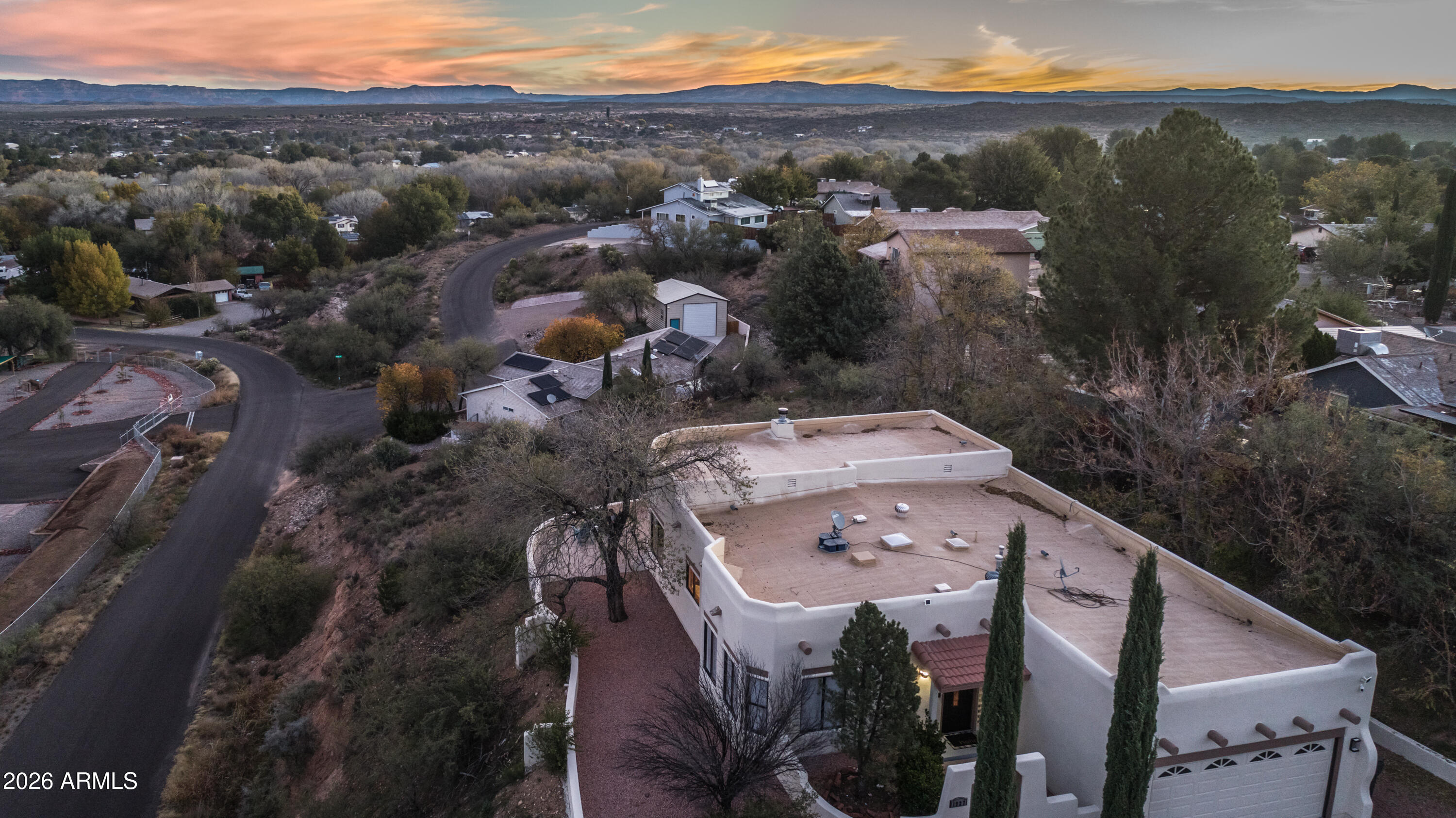 Successful 5-star STR opportunity with breathtaking Red Rock views of Sedona!  Enjoy stunning sunrises and watch hot air balloons from the extended patio with one of the BEST views in the neighborhood. This 3 bedroom, 2 bath home offers privacy and seclusion while still being a great full-time residence or investment property. An extra long driveway provides plenty of room for RV parking, toys and guests. Mingus Mountain views from the front of the home and Sedona views from the back make this property truly special. Located just minutes from historic downtown Cottonwood with award-winning restaurants, local shops, wine tasting rooms and the Verde River where you can float the river or walk along the river banks.  Easy access to Sedona, Jerome, local wineries and the Grand Canyon.TURN KEY!