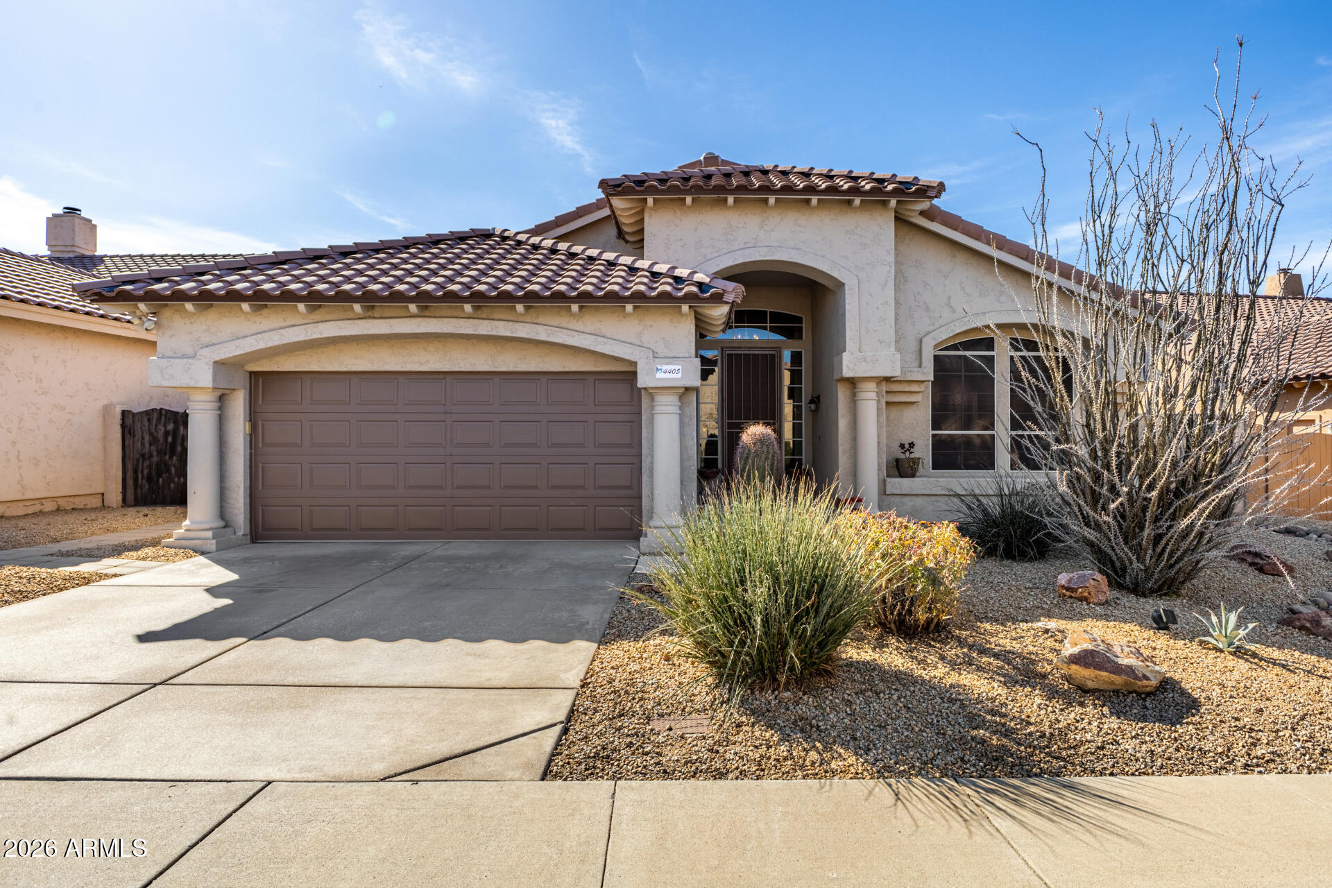Come visit, either for the first time or a re-visit, this Tatum Ranch 3 bedroom, 2 full bathroom house that is ready for immediate move-in. This split floor plan offers an inviting open layout. The primary suite has an extended bedroom with a door to the backyard and large closet. Tile flooring throughout with new carpet (replaced 5/16/26) in the living room and extra bedrooms. The open kitchen is perfect for entertaining with a large island and upgraded cabinetry. Vaulted ceilings and a neutral color scheme create a warm, airy atmosphere. The backyard has a view fence, sun sails, and flagstone extending the entertaining area. Roof and HVAC have been replaced. Close to elementary school and very walkable neighborhood!
