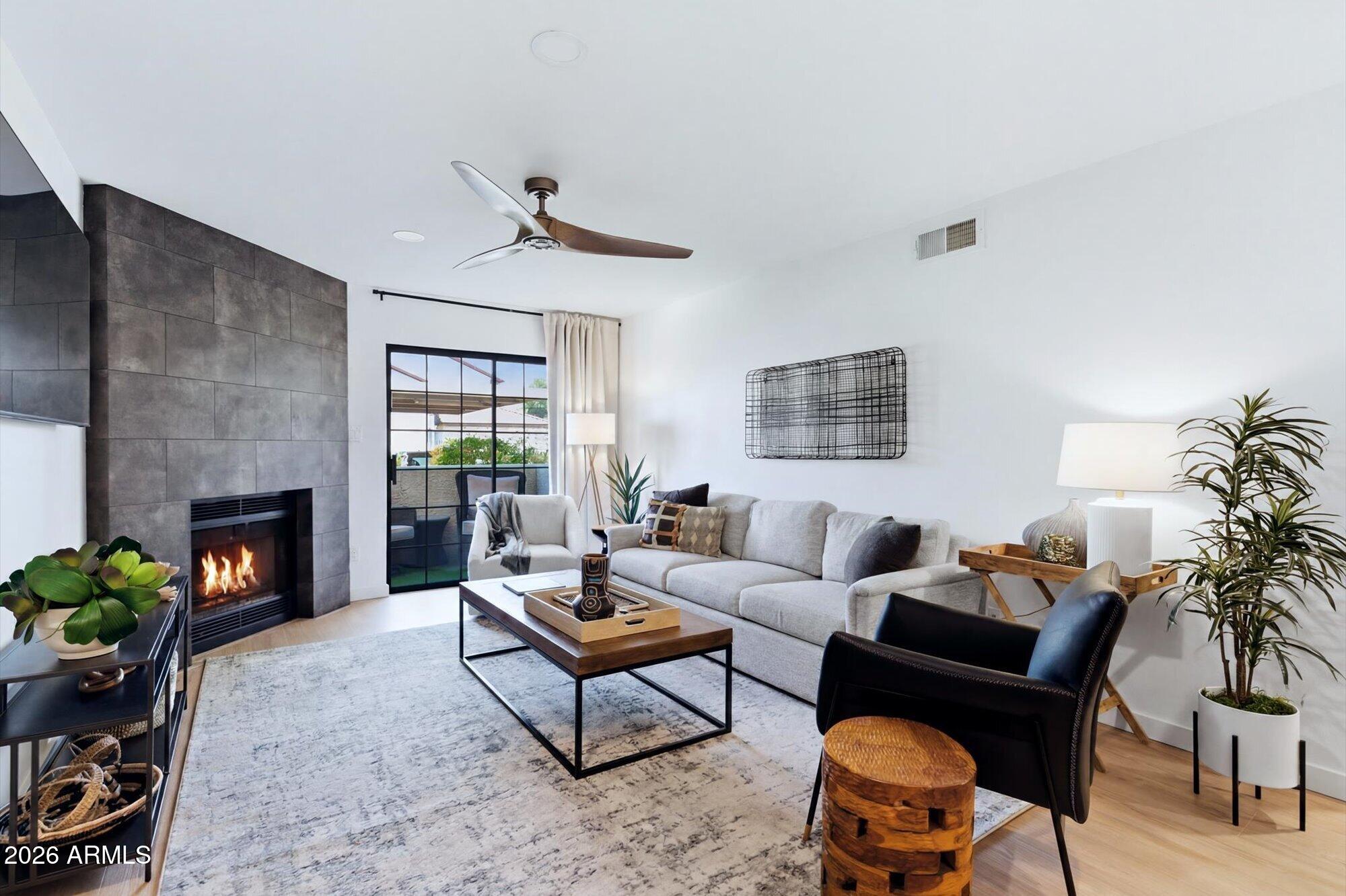 Completely renovated and professionally designed, this stunning ground-floor condo in a quiet gated community is truly turn-key. Roof replaced within the last year, plus new AC, water heater, and appliances all within the last 3 years -- zero work for the new owner. Enjoy your private patio, covered parking spot right out front, and resort-style amenities including a heated pool, hot tub, tennis court, racquetball court, and clubhouse -- all within a secure gated community. Located minutes from Honor Health, shopping, dining, walking paths, and highway access -- this one has it all. Don't miss it! Furnishings available with a separate bill of sale.
