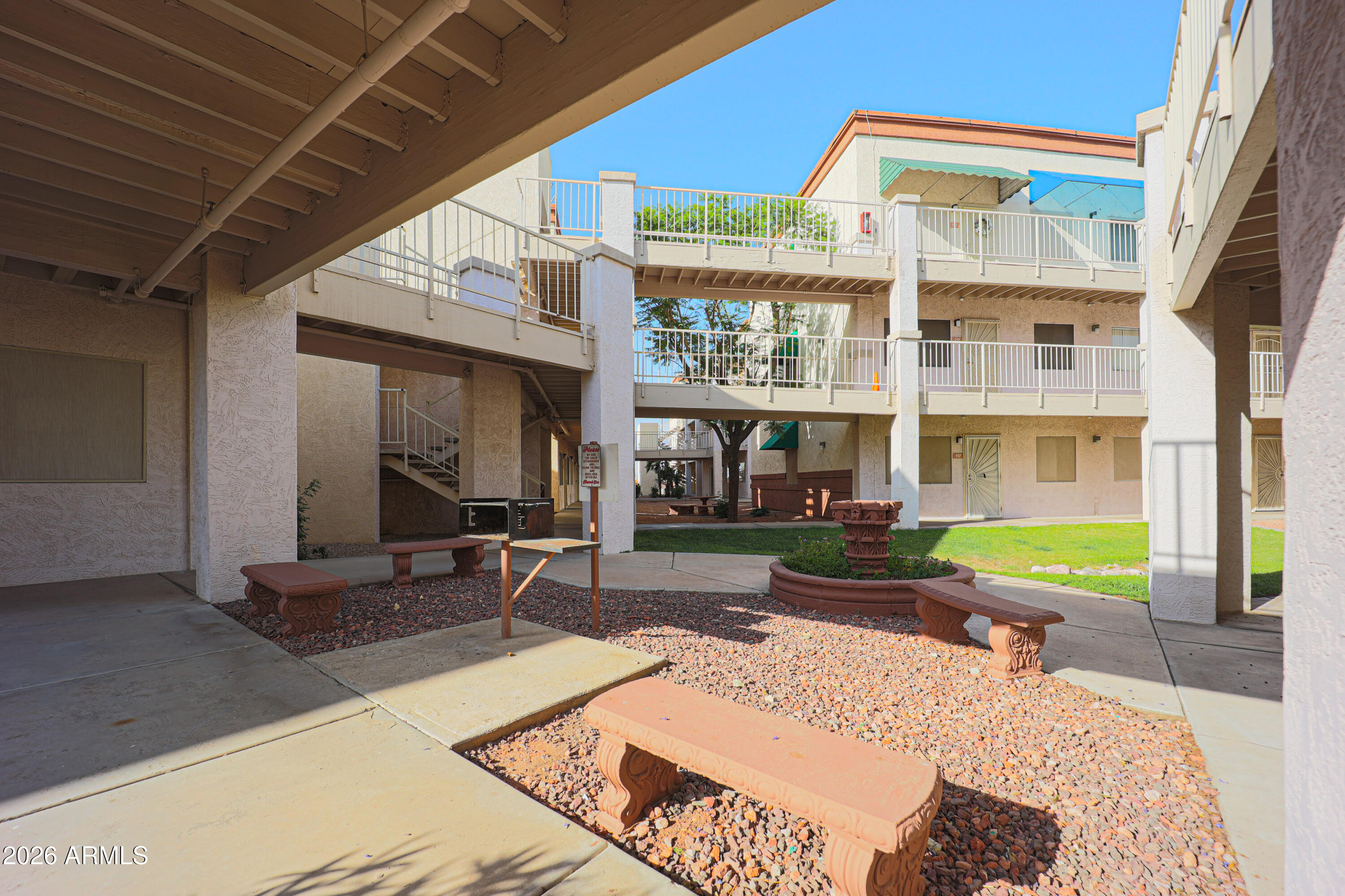 Investor-ready condo with an estimated 4.8% cap rate and 4.8% cash-on-cash return. A tenant is already in place with a lease through June 2027, offering immediate income, predictable occupancy, and an attractive buy-and-hold opportunity with long-term appreciation potential. 

First level upgraded 1 bedroom 1 bath unit at Cliffs Condomiium in a convenient Surprise location.  Bright open plan with plank flooring throughout.  Kitchen includes built-in microwave, electric range, full-size refrigerator and breakfast bar.  Bath with tub/shower combination and glass door enclosure.  Full size washer and dryer with shelves for additional storage. Back patio overlooks the club house and pool. Water, sewer, trash and roof replacement are included.