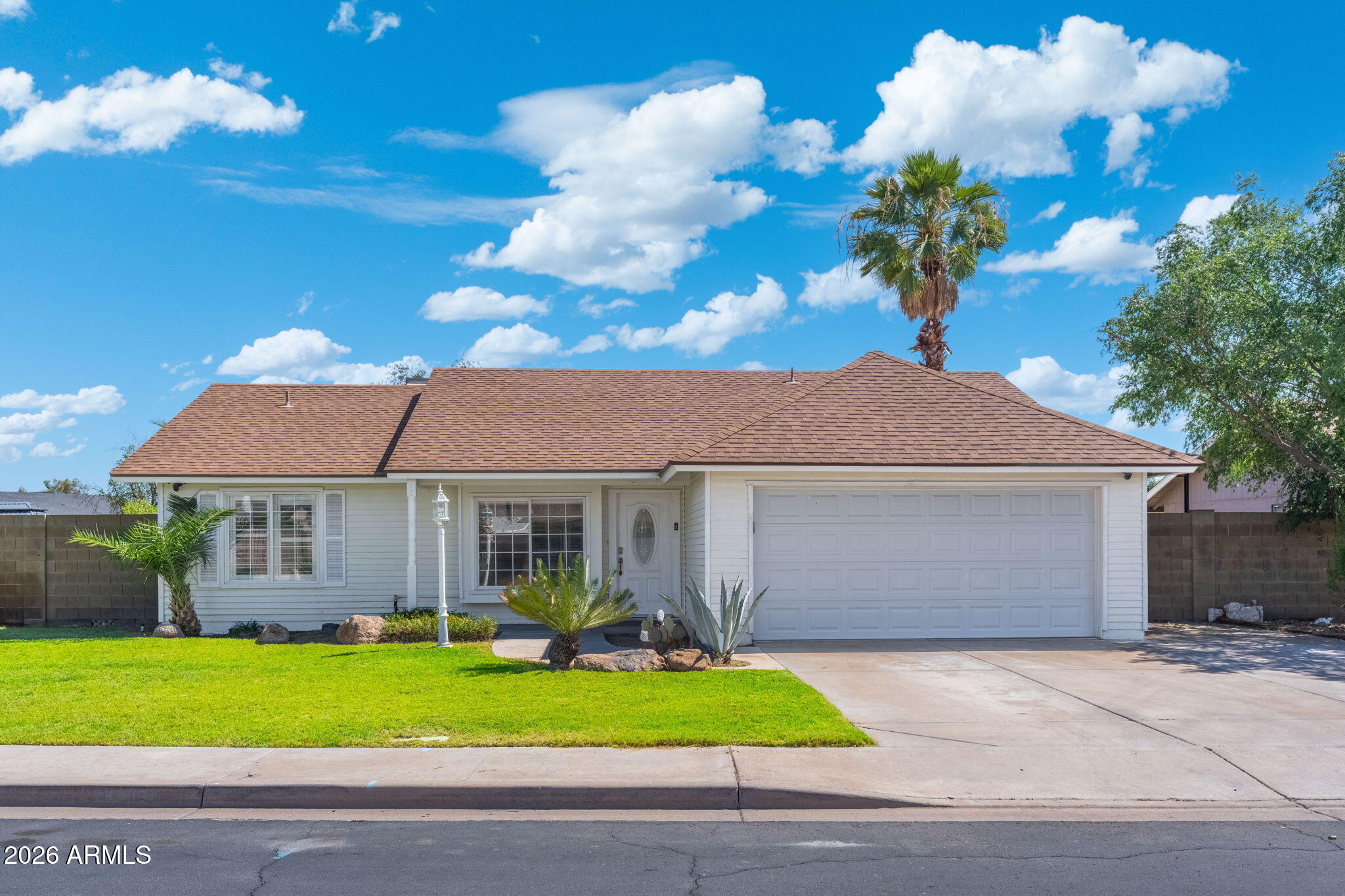 Really cute and upgraded 3 bed 2 bath Mesa home with oversized lot! This house has vinyl plank flooring, open floorplan with custom built cabinets and countertops, recessed lighting, attractively painted with wainscotting, stainless steel appliances, and a huge backyard. Centrally located in Mesa with nice city parks and a long greenbelt nearby, good schools, and low HOA fees, this home is ready for new owners!