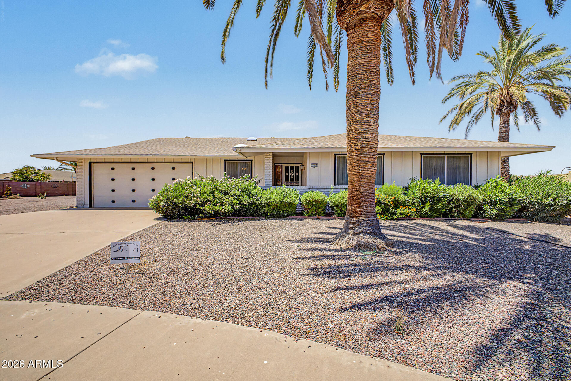 Welcome to this charming cul-de-sac home in the sought-after Sun City! Discover the bright and airy living areas ready to bring you joy, showcasing wood-look flooring, plenty of natural light, and neutral paint, offering plenty of potential for personalization. The kitchen comes equipped with abundant cabinetry, spacious counters, and built-in appliances for a seamless cooking experience. The main suite features a bathroom for added privacy. Whether you want to entertain guests or simply relax after a long day, the Arizona Room is the perfect spot. The 2-car garage boasts attached cabinets and hosts the 
laundry area for convenience. Out back, you'll have a sizable backyard perfect for weekend grills and peaceful evenings. What's not to love? Make it yours!
