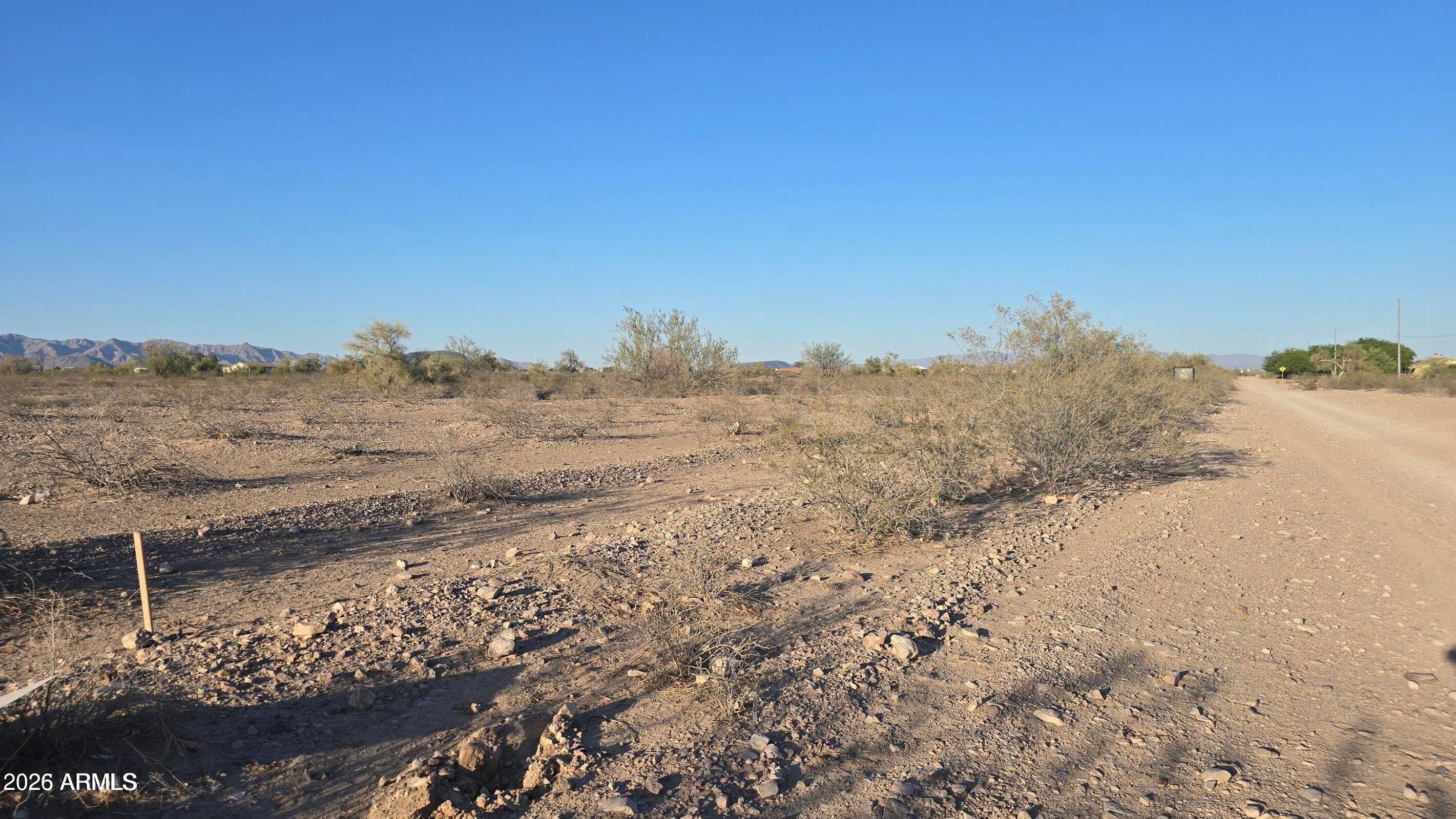 🌄 Flat parcel on Bethany Home Rd in the growing West Phoenix Estates 5 area. Seller financing available with just 20% down 💰 No HOA and not located in a floodplain 🚫🌊 Enjoy mountain views in every direction ⛰️ Surrounded by mostly 1-acre lots, this property offers plenty of potential for a custom home or future build. Mostly flat terrain with natural desert vegetation 🌵 Easy road access plus nearby power and water add convenience and value. As the area continues to expand, opportunities at this price point with seller financing are becoming harder to find 📈 Come walk the property and see the potential for yourself today 📍