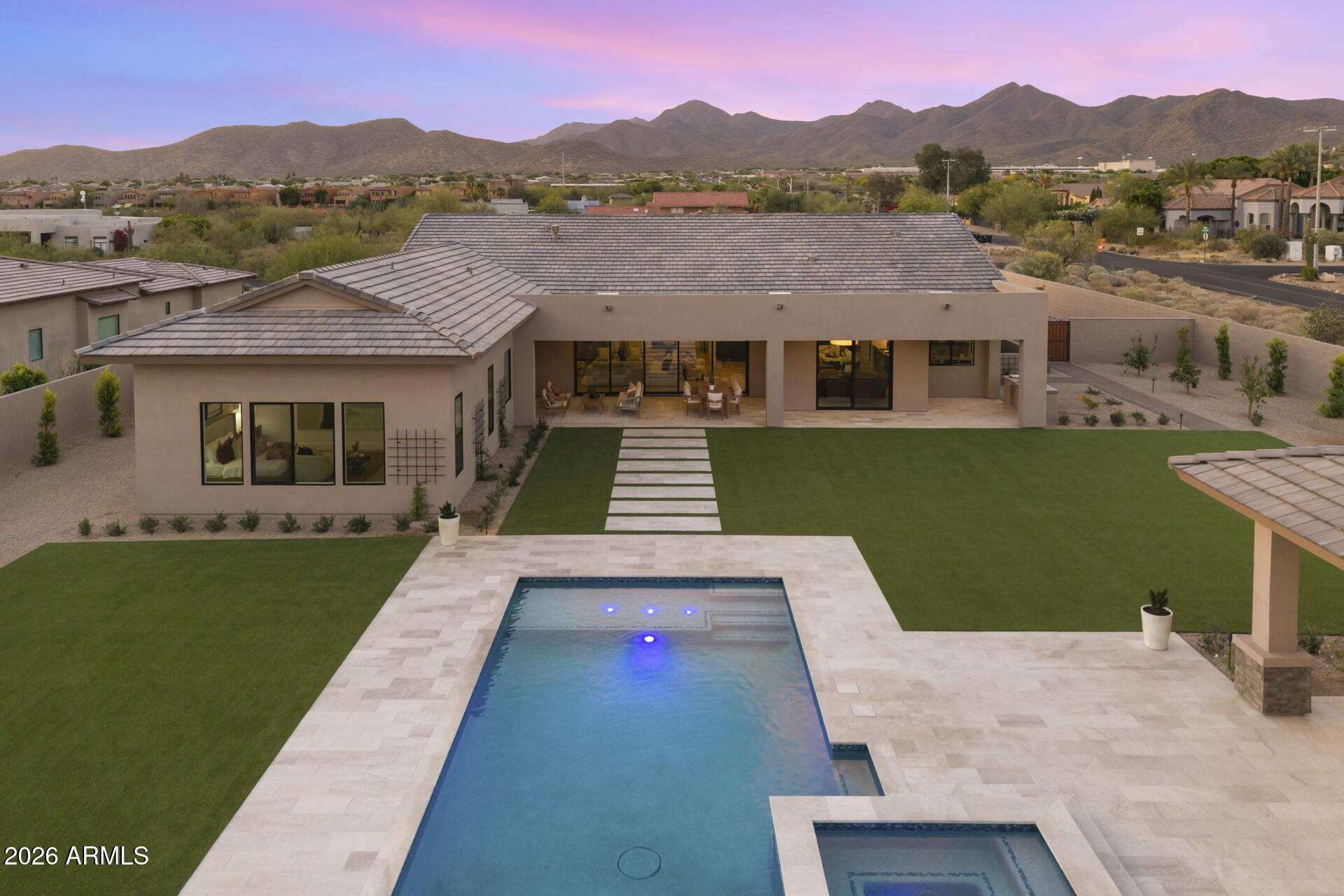 Final opportunity to own in the prestigious Emerald Hills community by Cachet Homes. Situated on an expansive ¾-acre homesite in Scottsdale's highly sought-after Shea Corridor, this brand-new luxury estate--scheduled for completion in Spring 2026--offers 4,909 square feet of refined single-level living. The thoughtfully designed floor plan features 4 bedrooms, 4.5 bathrooms, and a detached pool house complete with its own full kitchen, bath, and living space--ideal for guests or extended stays. At the heart of the home, a chef's kitchen impresses with dual islands, a wet bar, a separate service kitchen, and an expansive walk-in pantry.
Step outside to a resort-style backyard showcasing a sparkling pool and spa, lush landscaping, and views of the McDowell Mountains. All just moments from premier golf, scenic hiking and biking trails, upscale shopping, and top-rated schools--offering the very best of Scottsdale living.