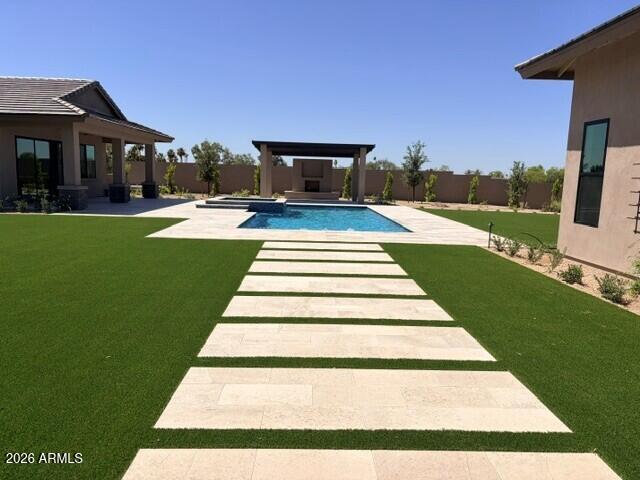 Final opportunity to own in the prestigious Emerald Hills community by Cachet Homes. Situated on an expansive ¾-acre homesite in Scottsdale's highly sought-after Shea Corridor, this brand-new luxury estate--scheduled for completion in Spring 2026--offers 4,909 square feet of refined single-level living. The thoughtfully designed floor plan features 4 bedrooms, 4.5 bathrooms, and a detached pool house complete with its own full kitchen, bath, and living space--ideal for guests or extended stays. At the heart of the home, a chef's kitchen impresses with dual islands, a wet bar, a separate service kitchen, and an expansive walk-in pantry.
Step outside to a resort-style backyard showcasing a sparkling pool and spa, lush landscaping, and views of the McDowell Mountains. All just moments from premier golf, scenic hiking and biking trails, upscale shopping, and top-rated schools--offering the very best of Scottsdale living.
