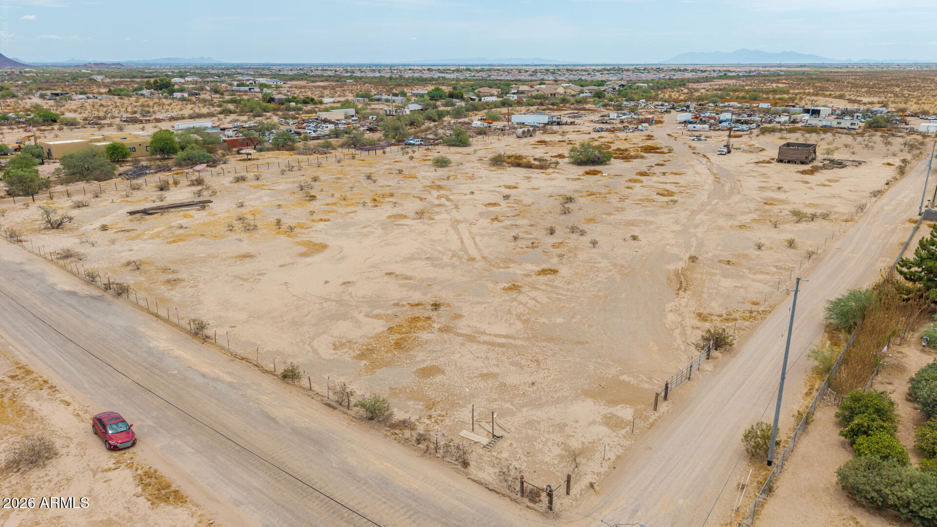 Rare opportunity to own 6.22 acres in one of the fastest-growing areas just outside of Surprise on a county island. With the potential to split into multiple parcels, this property is ideal for developers, builders, or investors looking to create custom homes. The property features a private well, with power nearby, making it an excellent opportunity for future development. Enjoy the flexibility of county island living while being just minutes from the area's continued growth, shopping, dining, and amenities. Don't miss your chance to secure a prime piece of land with outstanding potential.