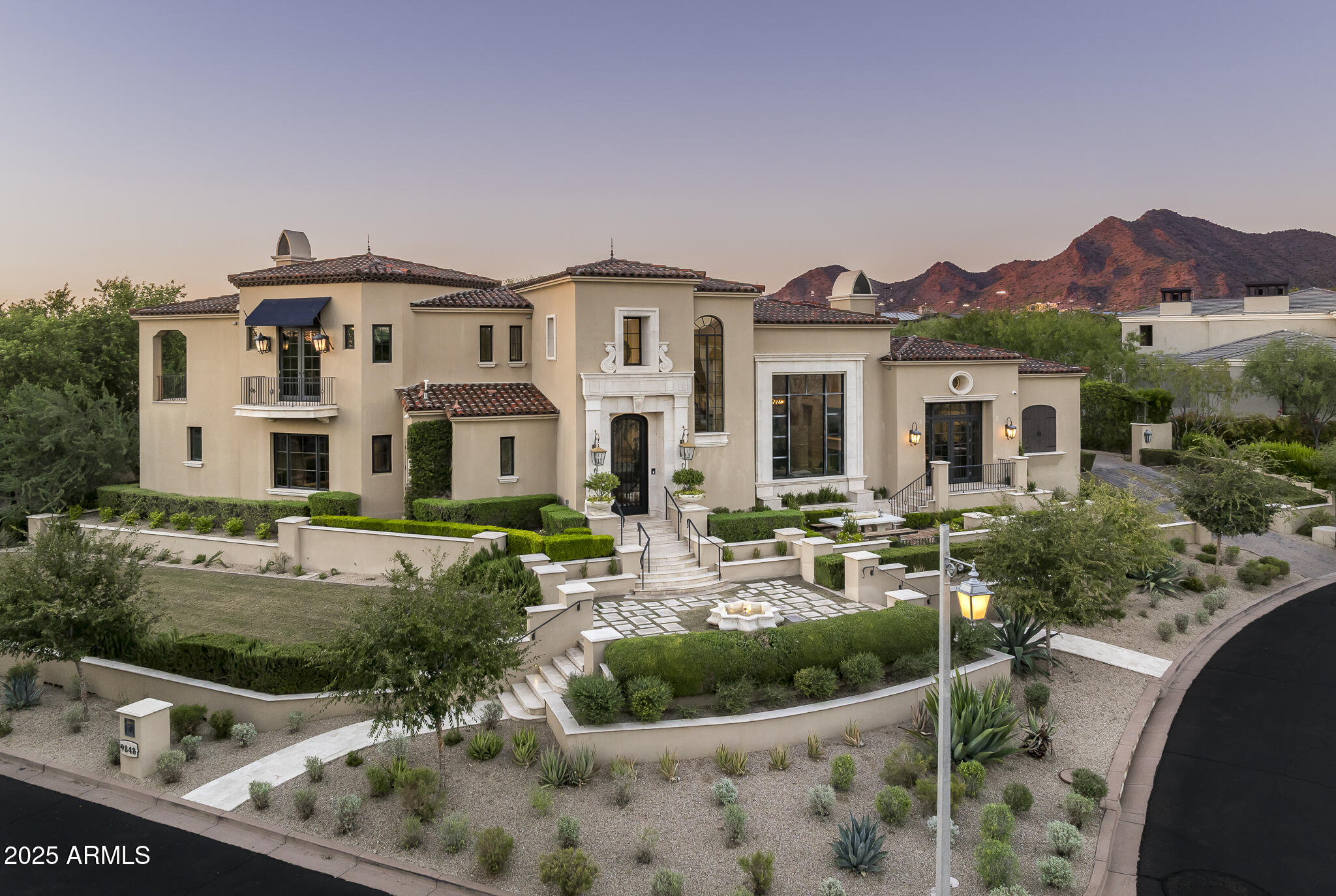 SILVERLEAF GOLF MEMBERSHIP OPPORTUNITY. 
Experience refined desert living in this beautiful formal Mediterranean estate, perfectly situated on a prime park-front corner lot within the exclusive guard-gated Arcadia at Silverleaf community. Created by Candelaria Design and masterfully updated with timeless sophistication, this residence blends architectural craftsmanship, elegant detail, and contemporary luxury.
Spanning 7,942 sq. ft. on a half-acre elevated lot, the home captures the essence of relaxed grandeur with a split floor plan designed for effortless entertaining and private retreat. The main level is anchored by a stunning great room with full-service bar, a gourmet chef's kitchen, and an elegant, curved breakfast room surrounded by glass that opens to park and mountain views. Additional spaces include a formal dining room, wine room, private theater, executive office, and fitness room, offering both function and sophistication throughout.
The primary wing is a sanctuary of comfort and luxury, featuring a cozy sitting area with fireplace, dual dressing rooms, a spa-like bath with soaking tub, and convenient secondary laundry. The guest wing and casita provide ideal flexibility offering multiple ensuite bedrooms, a guest lounge with covered view patio, and an attached casita with private den for extended stays or multi-generational living.
Outside, the home's resort-caliber amenities invite seamless indoor-outdoor living. Enjoy a saltwater pool and spa, multiple covered patios, pass-through kitchen windows, and tranquil fire and water features, all surrounded by lush, mature landscaping and a generous lawn overlooking one of Arcadia's signature parks.
This property represents a rare opportunity to own one of Silverleaf's most thoughtfully designed estates, where timeless architecture meets effortless luxury, and every detail reflects the art of desert living at its finest.

Silverleaf, located in North Scottsdale, Arizona, is a prestigious guard gated community known for its luxurious estates, exclusive golf courses, private Club and stunning desert landscapes. The Tom Weiskopf-designed Silverleaf Golf Course is a highlight for golf enthusiasts. With a blend of Spanish and Mediterranean-inspired architecture, the community offers a high standard of living, including upscale amenities like spas, fine dining, and exclusive shopping. Residents enjoy a harmonious balance between modern luxury and the natural beauty of the desert environment, making Silverleaf a sought-after destination for those seeking an exceptional lifestyle in North Scottsdale.