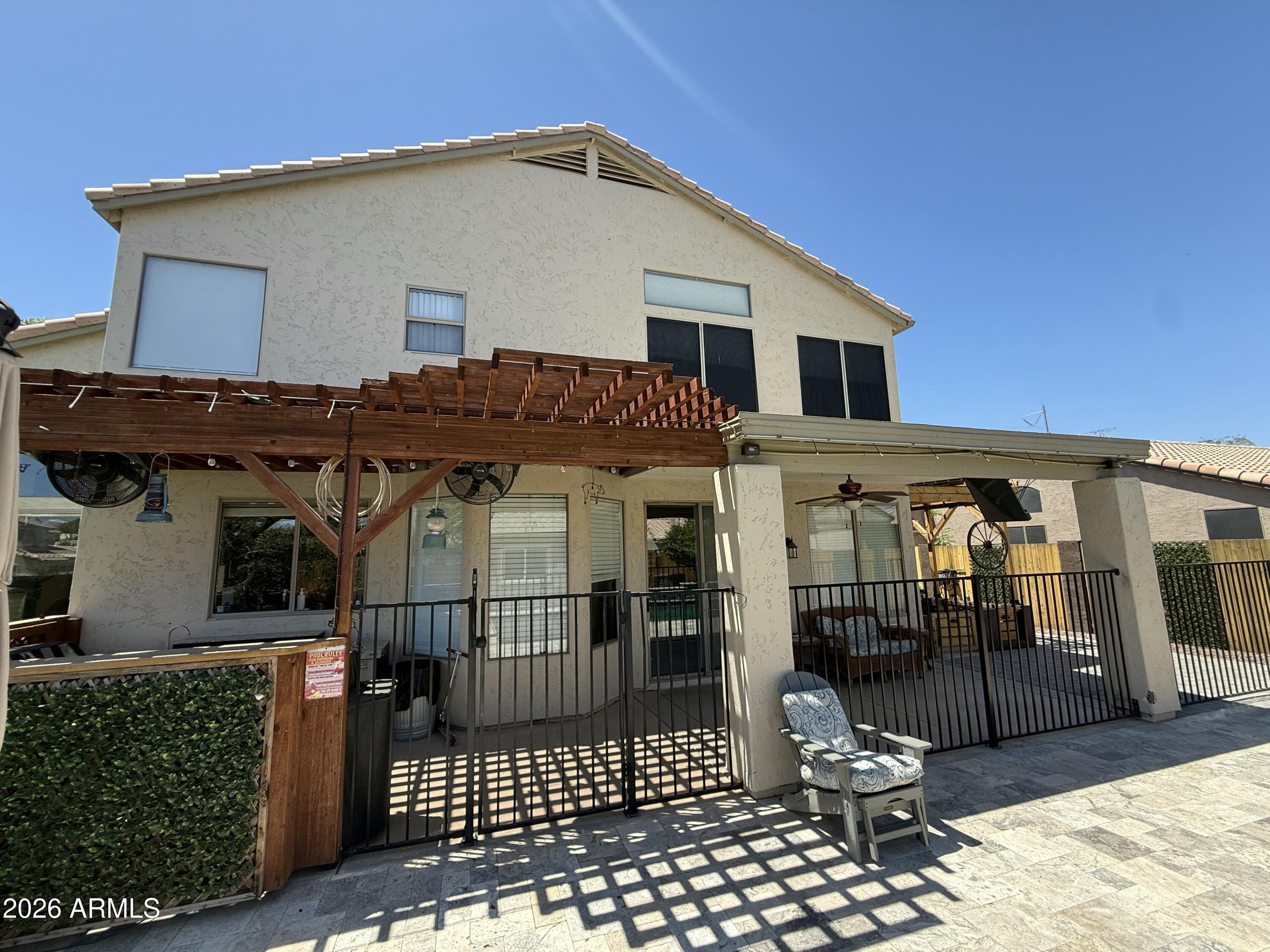 Location, Location and Resort Like Yard on Large Corner Lot. Spacious 4 Bedroom Home with a 1st Floor Bedroom and Full Bath, Ideal for Guests. High Ceilings, Large Windows, Formal Dining plus Eat-in Kitchen that Opens to Family Room and Extended Covered Patio with Misters and Newer Pool with Water Falls, Remote/Smart Phone Controls, Baha Shelf and all the Bells and Whistles, plus Pool House.  Interior Walls of yard are lined with Cedar to Significantly Reduce Ambient Heat. Beautiful Yard with Citrus Trees and Raised Garden Beds, and Plenty of Room for Family and Pets. The Tesla Power Battery with 22 Panel Solar adds even More Value along with Entire House Water System w/ UV Light and No Salt Required.  New Water Heater, New Rv Gate, Roof 2020, Security Cameras and More. 
Don't Wait!