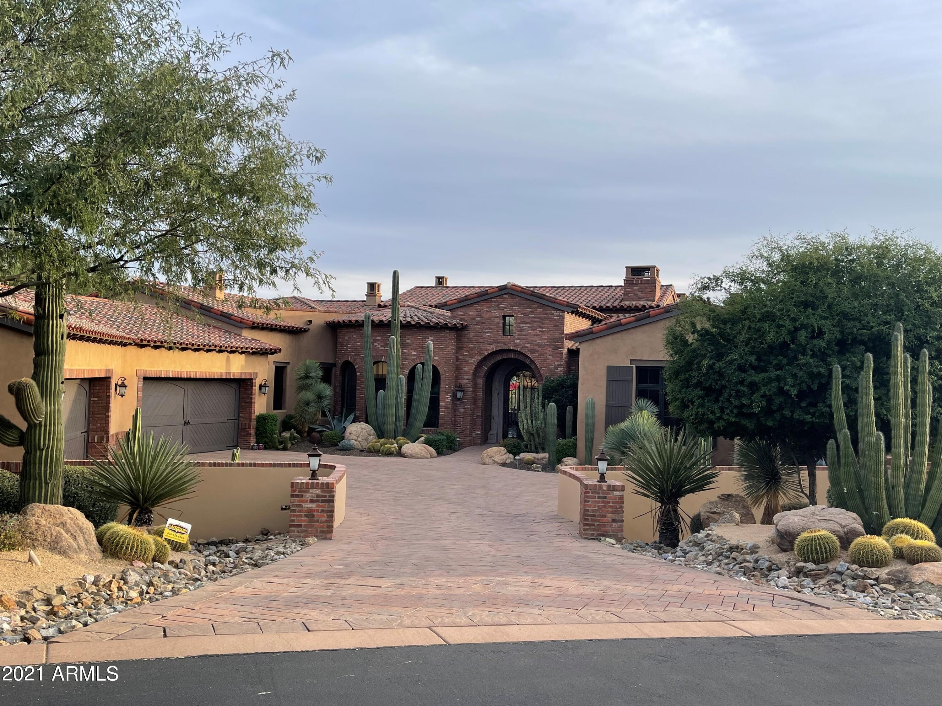 Beautiful Santa Barbara style home that has been recently updated located on a gorgeous south facing fairway lot on the 4th hole of the Tom Fazio designed Mirabel Club golf course. Home consists of 4 bedrooms, 7 bathrooms, an exercise room plus a home theater. Views include golf, Pinnacle Peak, the McDowell's, sunsets and city lights.