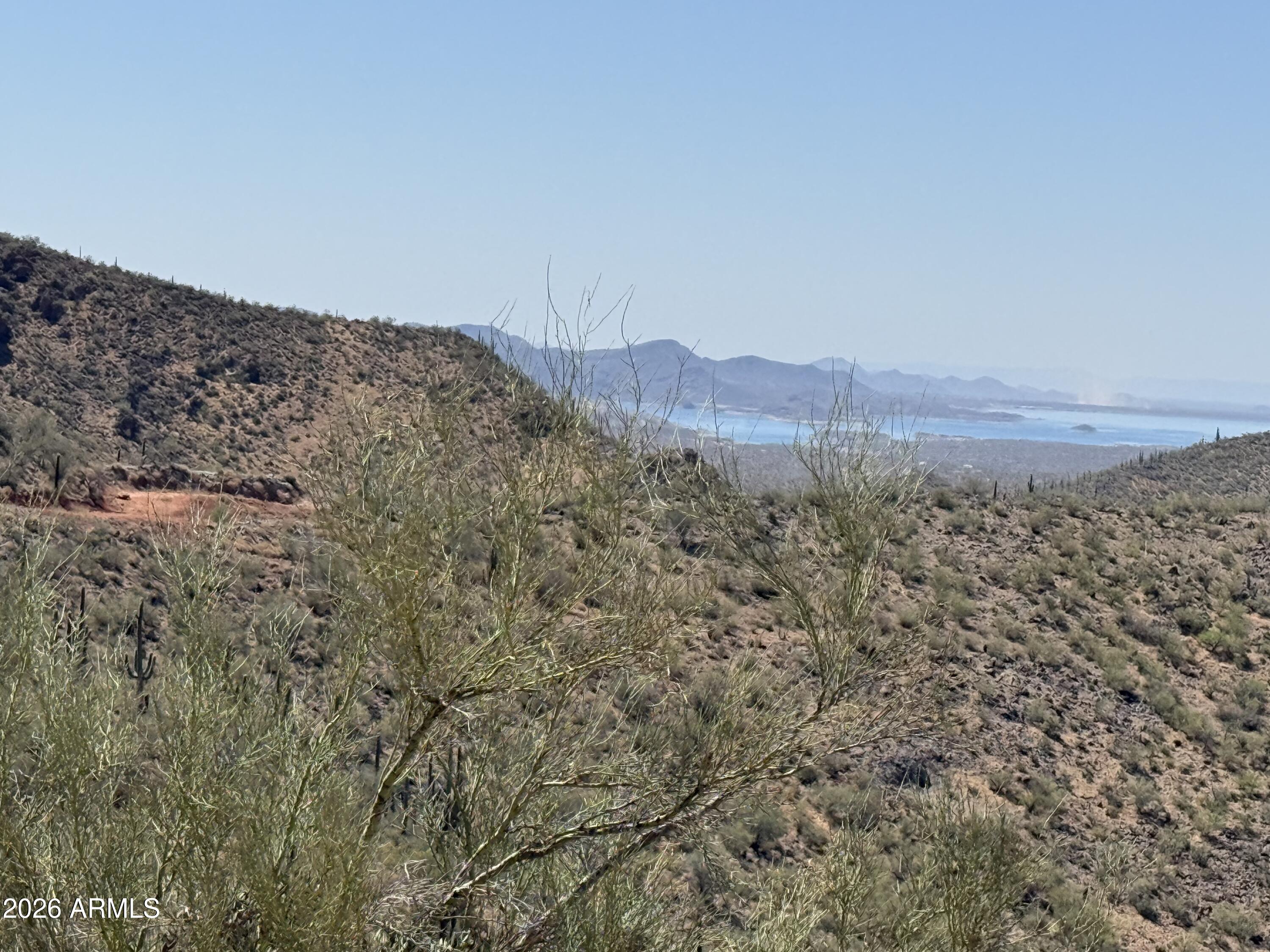 CLOSEST PROPERTY TO THE LAKE WITH GORGEOUS LAKE VIEWS ONLY TWO MILES FROM THE LAKE TWO OR MORE ACRES AVAILABLE  SEMI PRIVATE ROAD DEAD ENDS INTO THE WILDERNESS AREA  ON THE SIDE OF THE MOUNTAIN ARE SURVEY STAKES  YOU NEED THE PLAT MAP WITH COORDINATES.
USE ONXHUNT OR REGRID APP TO LOCATE THE CORNERS..  THE SIGN IS BELOW THE ACTUAL PROPERTIES
