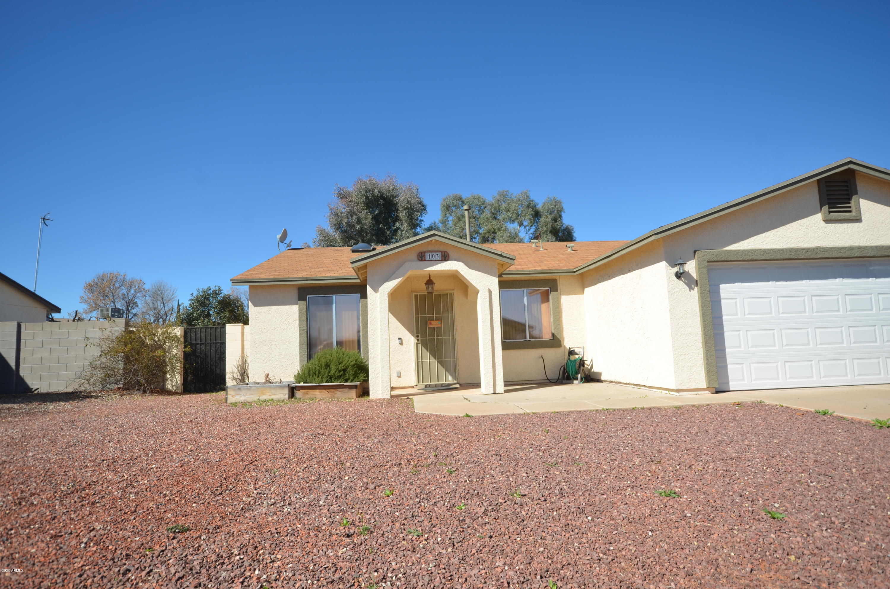 This charming home is located within an easy commute to Ft. Huachuca and Sierra Vista and is waiting for you! This 1783 sqft home features 3 bed 2 bath and has been painted recently inside and out, ceramic tile throughout, a bright open kitchen with stainless steel appliances and breakfast bar, large size dinning area for large table, his and her closets in the master bedroom with walk-in shower in the master bathroom, separate laundry room and tiled garage! Enjoy lots of family time in the backyard with covered patio. This home is priced to sell and won't last long! Call TODAY for your own private showing!