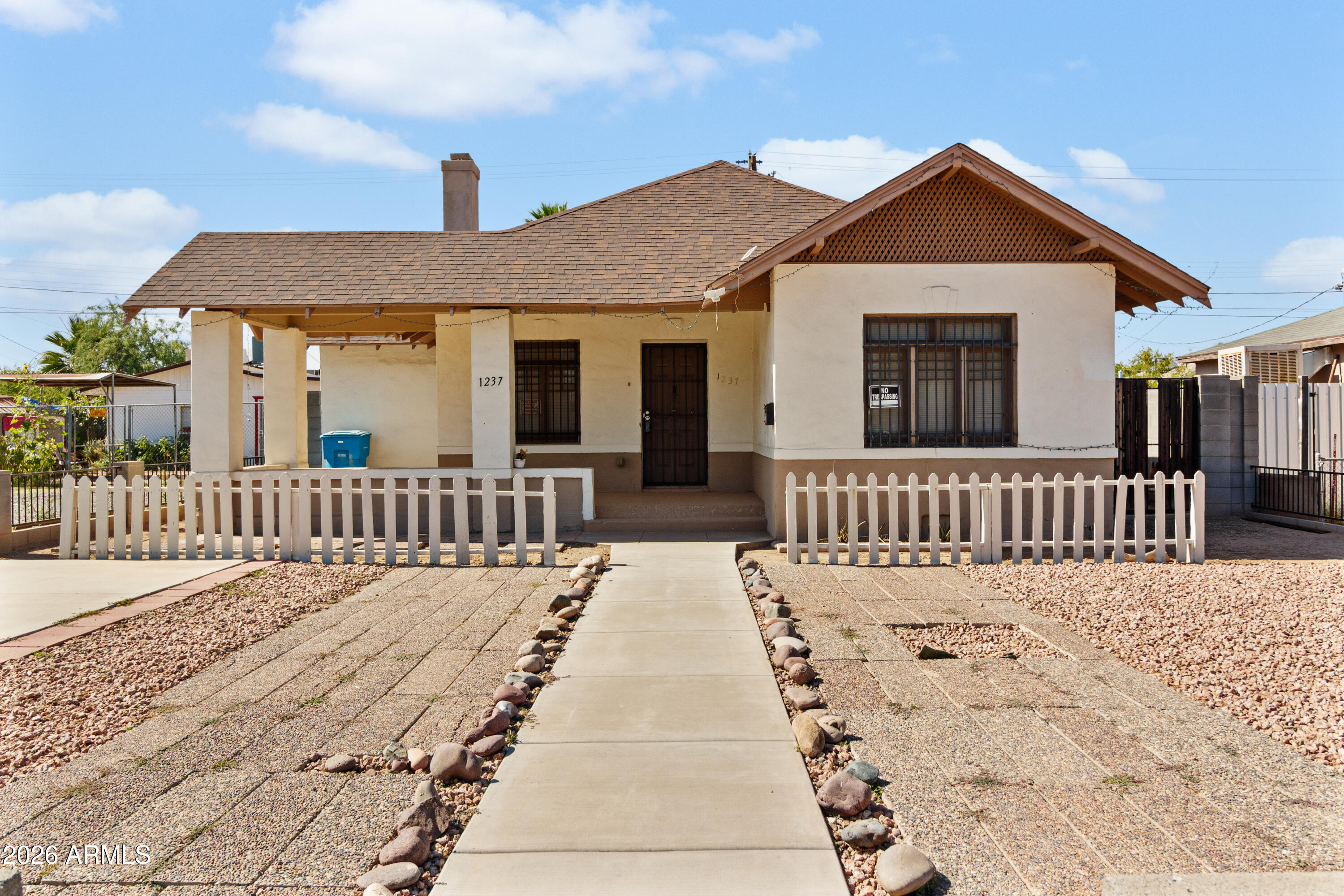 Great opportunity to own this 2-bed, 1-bath home located in the Garfield Historic District, minutes from Down Town & Chase Field. With newer A/C, & Stucco, the front porch is just the beginning. Inside is bright & light, open living room & formal dining space. The galley kitchen, featuring a gas range & wood cabinetry. Home has lots of potential - just bring your imagination.  Features split bedrooms with a storage room on the back that could easily be converted into 3rd bedroom. Check out the private backyard, an ideal spot to craft your own ideas with the detached car garage that could be turned into a guest room/suite. This your chance to shape something truly special! Home is close to schools, shopping and entertaining! This is a Must See....