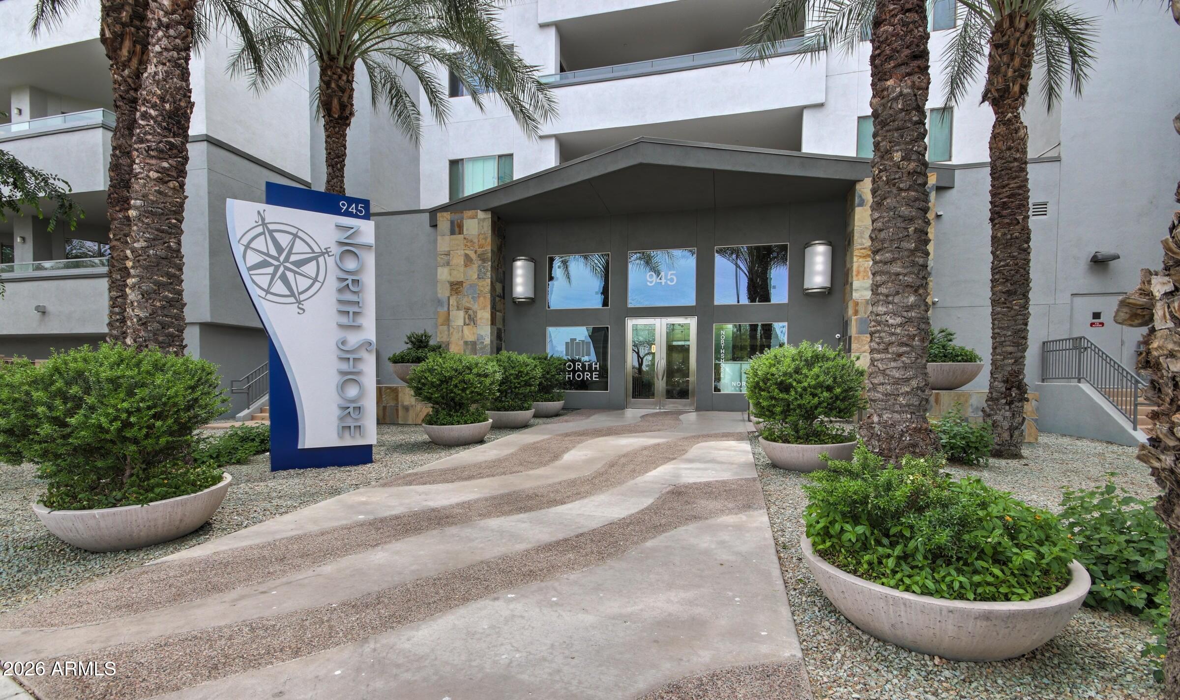 Luxury living meets an unbeatable Tempe Town Lake location! This beautifully appointed 2-bedroom, 2-bath corner-unit condominium offers the perfect blend of comfort, style, and convenience. The open-concept living room flows seamlessly into a contemporary kitchen featuring stainless steel appliances and a spacious eating island. Step onto the large private balcony and unwind by the cozy outdoor fireplace. The primary suite includes dual sinks, a relaxing soaking tub, and a walk-in closet, while the second bedroom offers its own walk-in closet and soaring ceilings for an open, airy feel. Complete with two designated parking spaces and 24/7 security, this exceptional home places you just moments from the scenic shores of Tempe Town Lake, dining, entertainment, and more.
