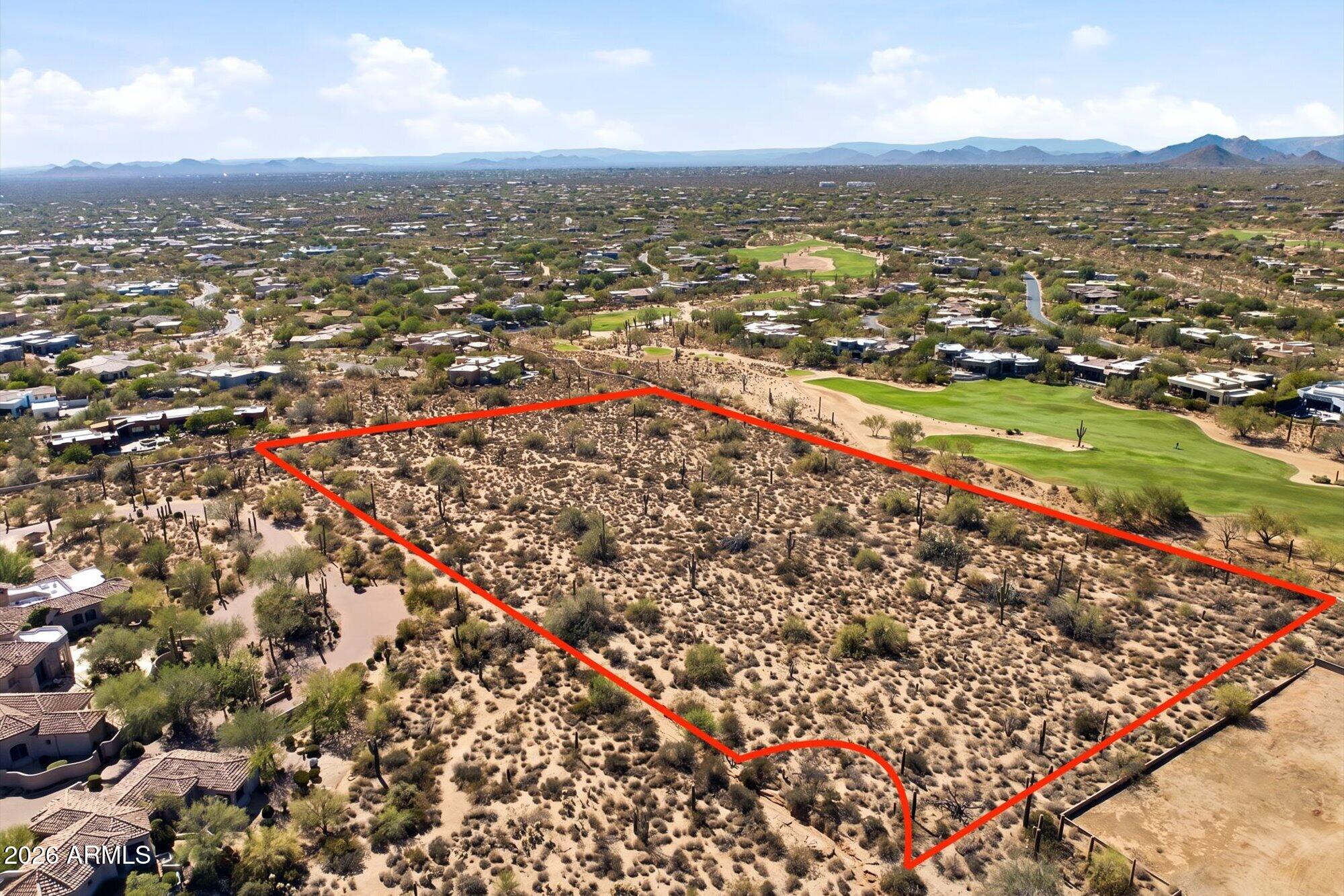 Wonderful opportunity to build on this secluded 5.35-acre cul-de-sac lot offering stunning Pinnacle Peak, mountain, golf course, and city light views. Elevated homesite backs to the 8th fairway of the Desert Highlands Golf Club and provides exceptional privacy surrounded by luxury estates. The property also offers potential to be split into two parcels, creating additional flexibility for future development. Prime North Scottsdale location just minutes from premier golf, dining, shopping, hiking, and world-class amenities.