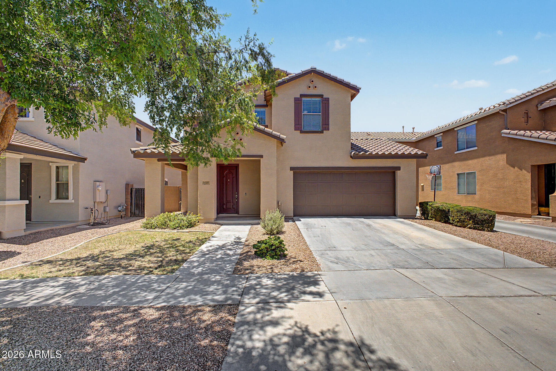Welcome to this beautifully maintained home in the desirable Lyons Gate community, ideally located directly across from a greenbelt and community pool. This spacious floor plan features 3 bedrooms, 2.5 bathrooms, and an upstairs loft perfect for a home office, play area, or media room. The kitchen offers granite countertops, stainless-steel appliances, gas stove, center island, and ample cabinet space overlooking the great room and dining area. The primary suite features dual sinks, walk-in closet, and a private bath. Additional highlights include an upstairs laundry room, neutral finishes throughout, tile flooring in high-traffic areas, and abundant natural light. Enjoy the low-maintenance backyard complete with synthetic turf and a covered patio space ideal for relaxing or entertaining. Conveniently located near shopping, dining, schools, and freeways.

Don't miss this opportunity to own a move-in-ready home in one of Gilbert's most sought-after communities.
