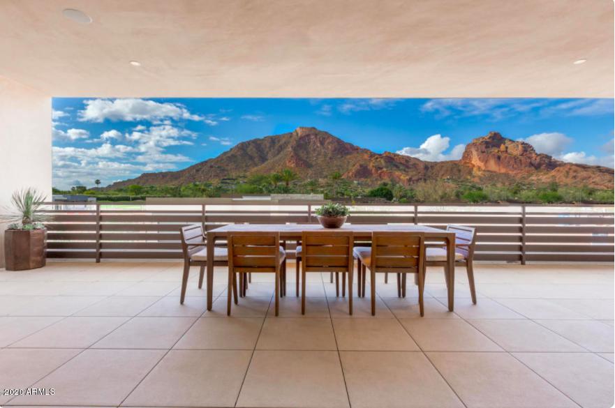 One of the best views with Camel back mountain  in Phoenix and Luxury Villa at Mountain Shadows Resort Paradise Valley! Enjoy resort living w/ full amenities at adjacent resort combined with distinct architectural designs. Enjoy views from 800+ sq. ft. outdoor deck. This Villa has 20 ft. high entry foyer with private elevator/stairs to living level. Luxurious designer features include, Wolf combo dual fuel range oven and microwave, Sub Zero refrigerator, Asko dishwasher, 
Zephyr hood,10 ft. high ceilings, 9 ft. bi-fold doors to deck,9 ft. bi-fold from master suite to deck, indoor/outdoor fireplaces, 3 bedroom, 3.5 bathroom.
 Amazing amenities with pool and Gym at the hotel, 24 hr guarded entry, & more.
Hurry not to miss great opportunity!