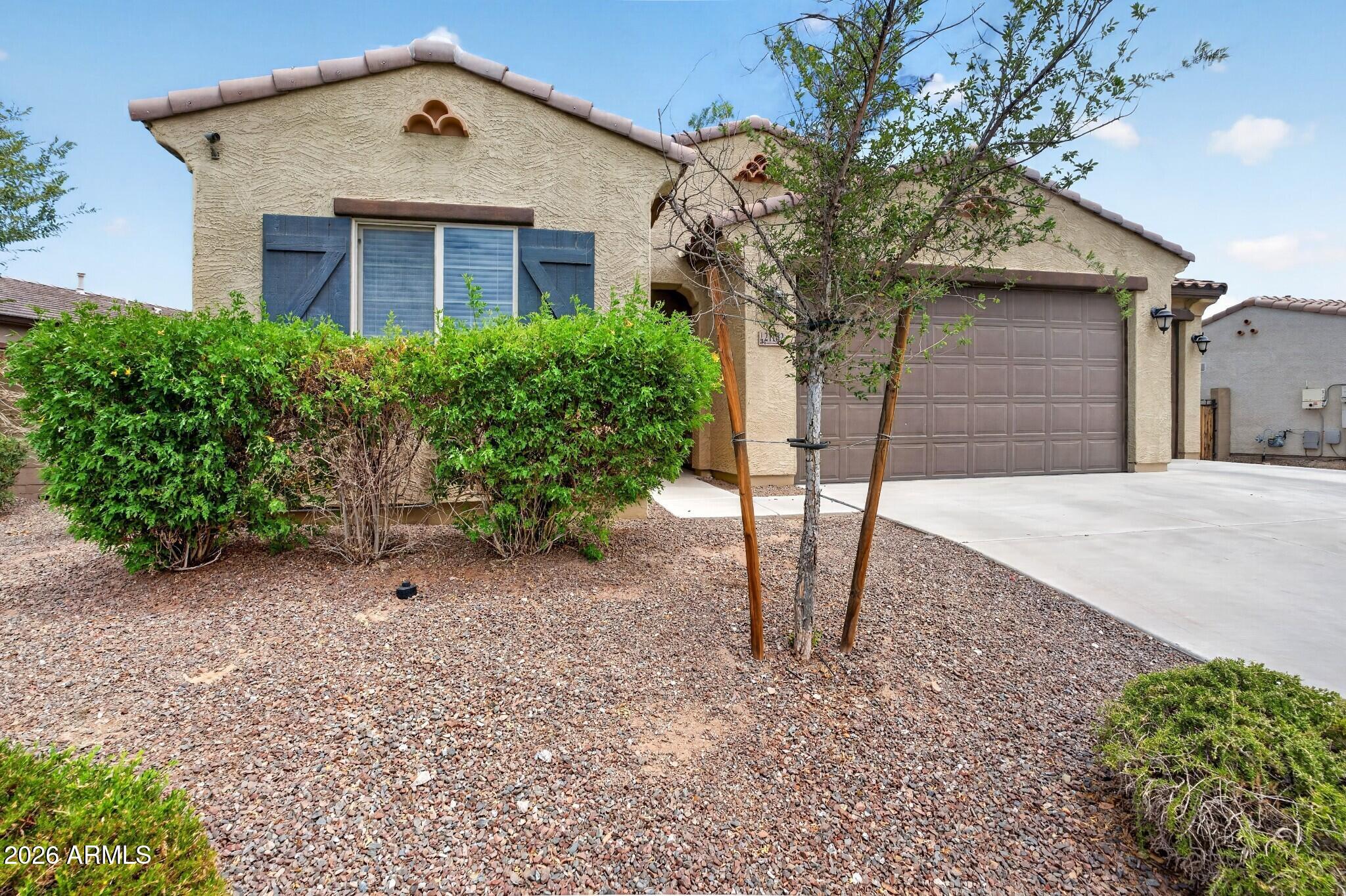 Welcome to this beautifully maintained single story home in the highly desirable Sienna Hills community of Buckeye! Built in 2017, this spacious 4 bedroom, 2 bath residence offers a functional open concept floor plan designed for modern living. The expansive great room flows seamlessly into the kitchen and dining area, creating the perfect space for entertaining and everyday enjoyment.

The well appointed kitchen features ample cabinetry, generous counter space, and a large island ideal for meal prep and gathering with family and friends. The private primary suite offers a relaxing retreat with an ensuite bath and walk-in closet, while three additional bedrooms provide flexibility for guests, a home office, or growing households. Situated on a large lot, the backyard offers endless possibilities for outdoor living, recreation, or future customization. The oversized 3-car garage provides abundant space for vehicles, storage, and hobbies. Located in the popular Sienna Hills master-planned community, residents enjoy parks, walking trails, green spaces, and convenient access to shopping, dining, schools, and major commuter routes.

Don't miss this opportunity to own a newer home with room to grow in one of Buckeye's most sought-after neighborhoods!