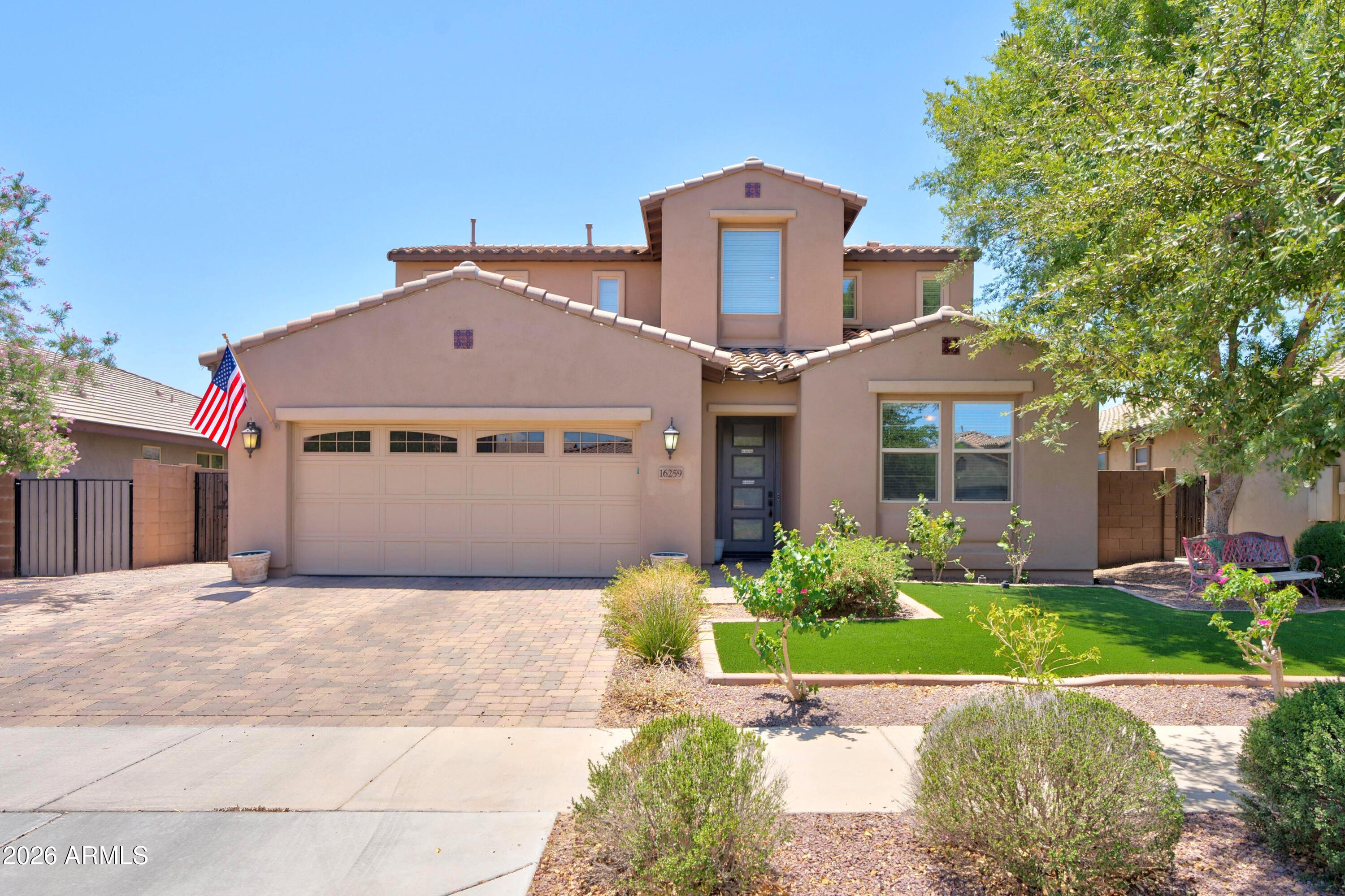 Spacious and thoughtfully designed, this Surprise home offers comfortable indoor-outdoor living. The open layout features a large great room, formal dining area, dedicated office, and beautiful kitchen with granite countertops, large island, abundant cabinetry, and stainless steel appliances. The primary suite includes a walk-in closet and private bath, while additional bedrooms offer flexibility for guests, hobbies, or work-from-home needs. Outside, enjoy a covered patio, paver entertaining area, expansive grass backyard, and paved side yard/outside parking from side to back. Additional highlights include a 3-car garage with built-in storage, built-in 7-speaker system, camera sensors, newer HVAC system (one unit replaced), newer water heater, and newer garage door.