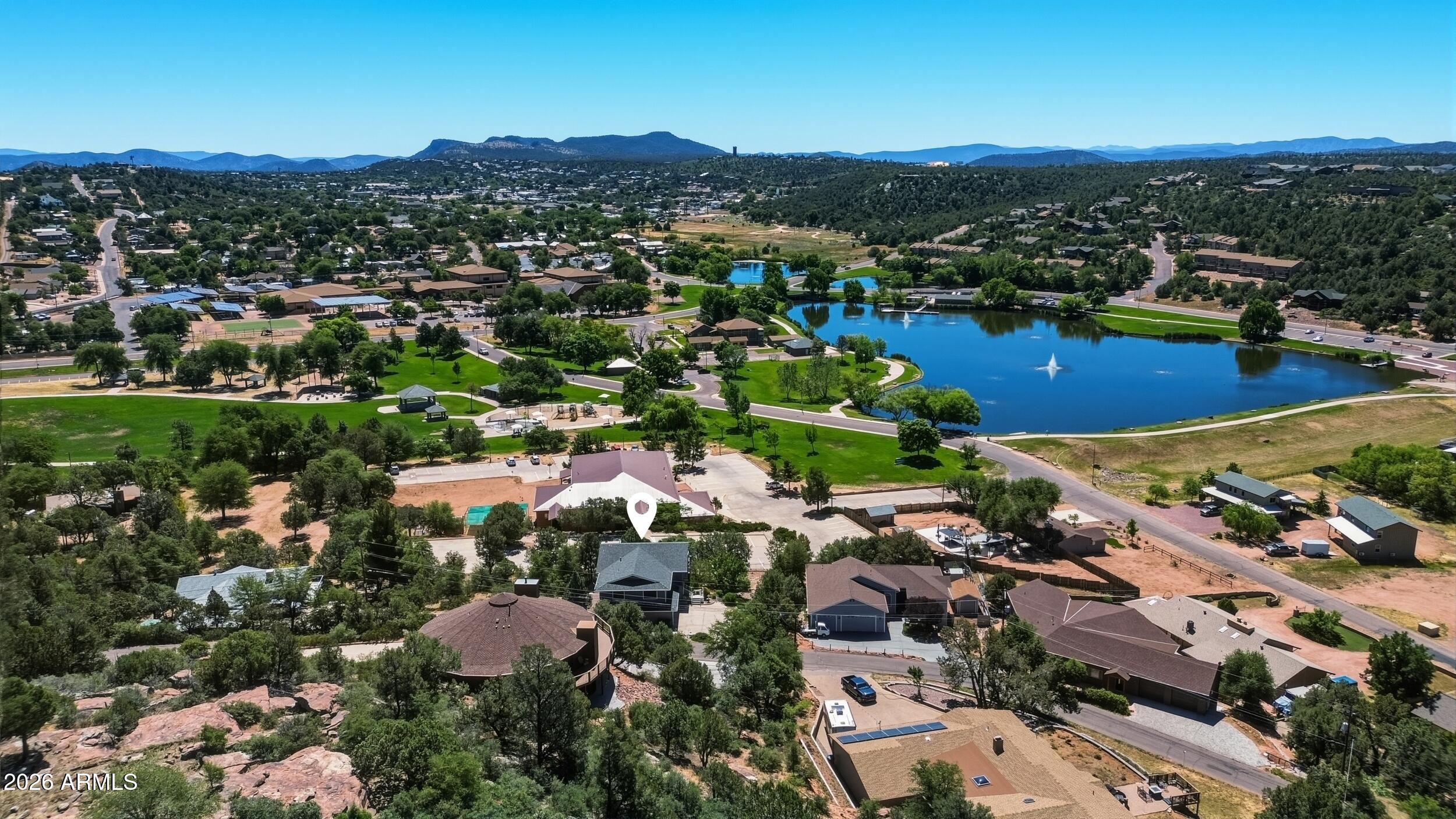 Views, Views and more Views of Green Valley Park. Welcome home to this well maintained  three bedroom, three bath home. Just a few steps up from the foyer is the main living space with the primary bedroom on the same level.
Enjoy the cool nights on the deck overlooking the lake and the park. Downstairs offers two additional bedrooms and bath. Workshop  with built-in shelving. fully fenced with seperate dog run.