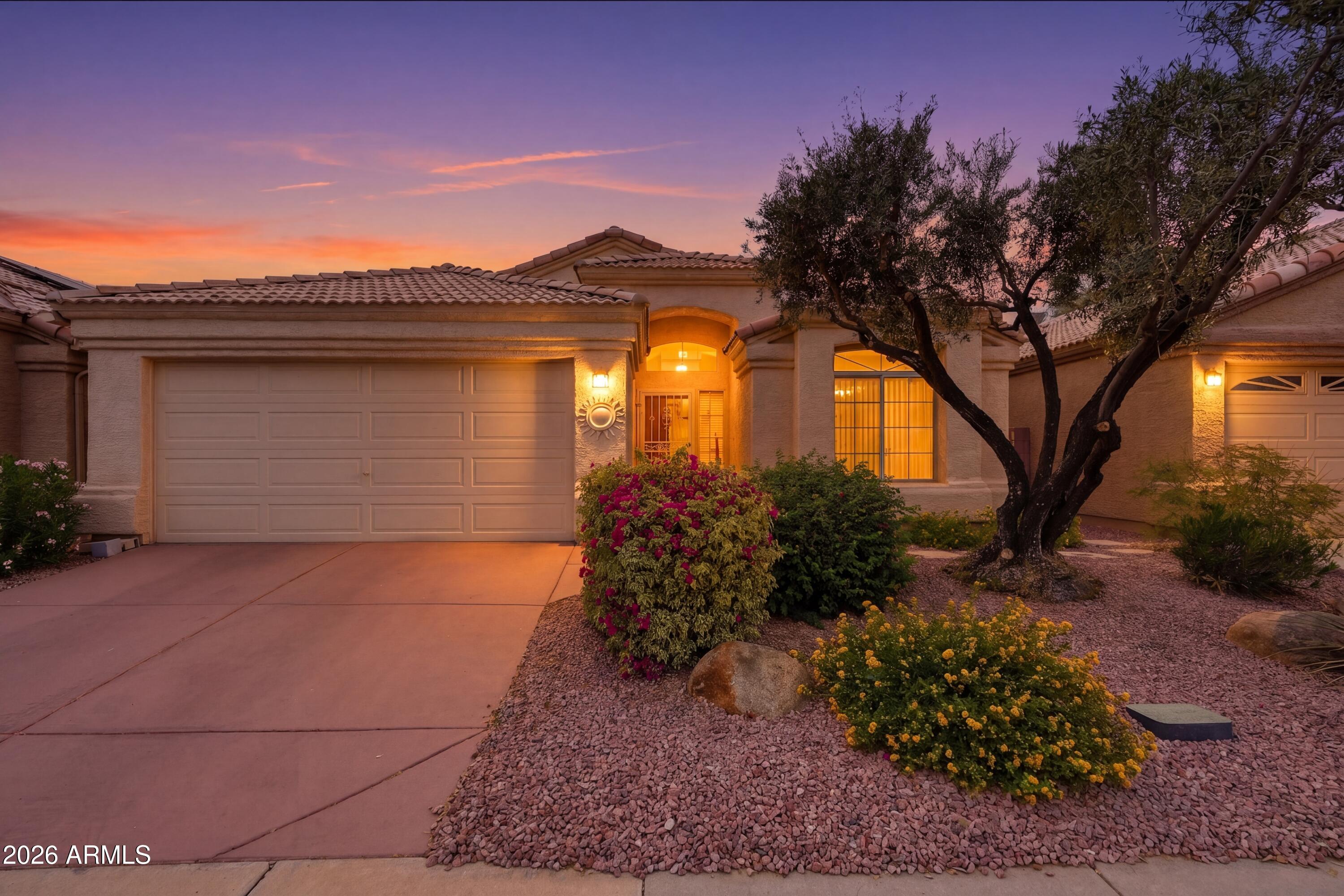 Located in Pueblo Village, this property offers a tranquil lakefront setting with a well-appointed interior. Fresh interior paint & exterior paint 2 years. The home features approximately 1,427 square feet of living space with 2 BR 2 Baths. The primary BR boasts a private exit, providing direct access to the outdoors patio. Vaulted ceilings throughout the home create a sense of openness while skylights allow natural light to flood the living spaces. The split floor plan offers privacy and functional separation. The kitchen is equipped with stainless steel appliances, complementing the modern aesthetic. A covered patio extends the living area, offering an inviting outdoor retreat. A picture window in the living room frames the serene lakefront landscape, providing a picturesque focal point