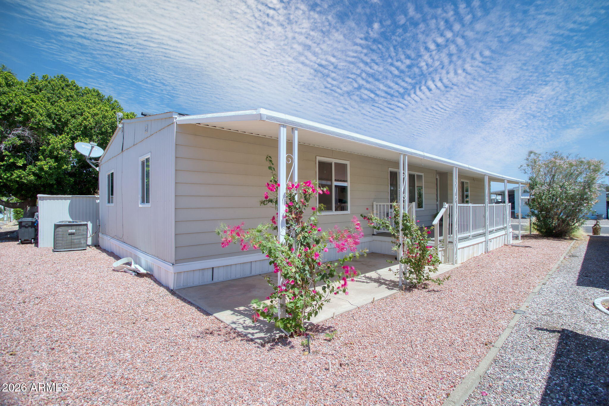 This 3-bedroom, 2-bathroom home features an open floor plan with several updates completed in recent years. The property includes a roof, AC unit, vinyl windows, and water heater that were all replaced within the last few years, alongside a refreshed interior and exterior paint palette. The kitchen was previously remodeled with cabinets, granite countertops, a tile backsplash, and stainless steel appliances with a vent hood. Additional interior improvements include laminate flooring, updated lighting, and ceiling fans in every room. Both bathrooms were also updated in recent years with cabinets, granite countertops, and showers. This pet-friendly residence is located in a 55+ community, with 40+ residency options potentially available depending on current community capacity.