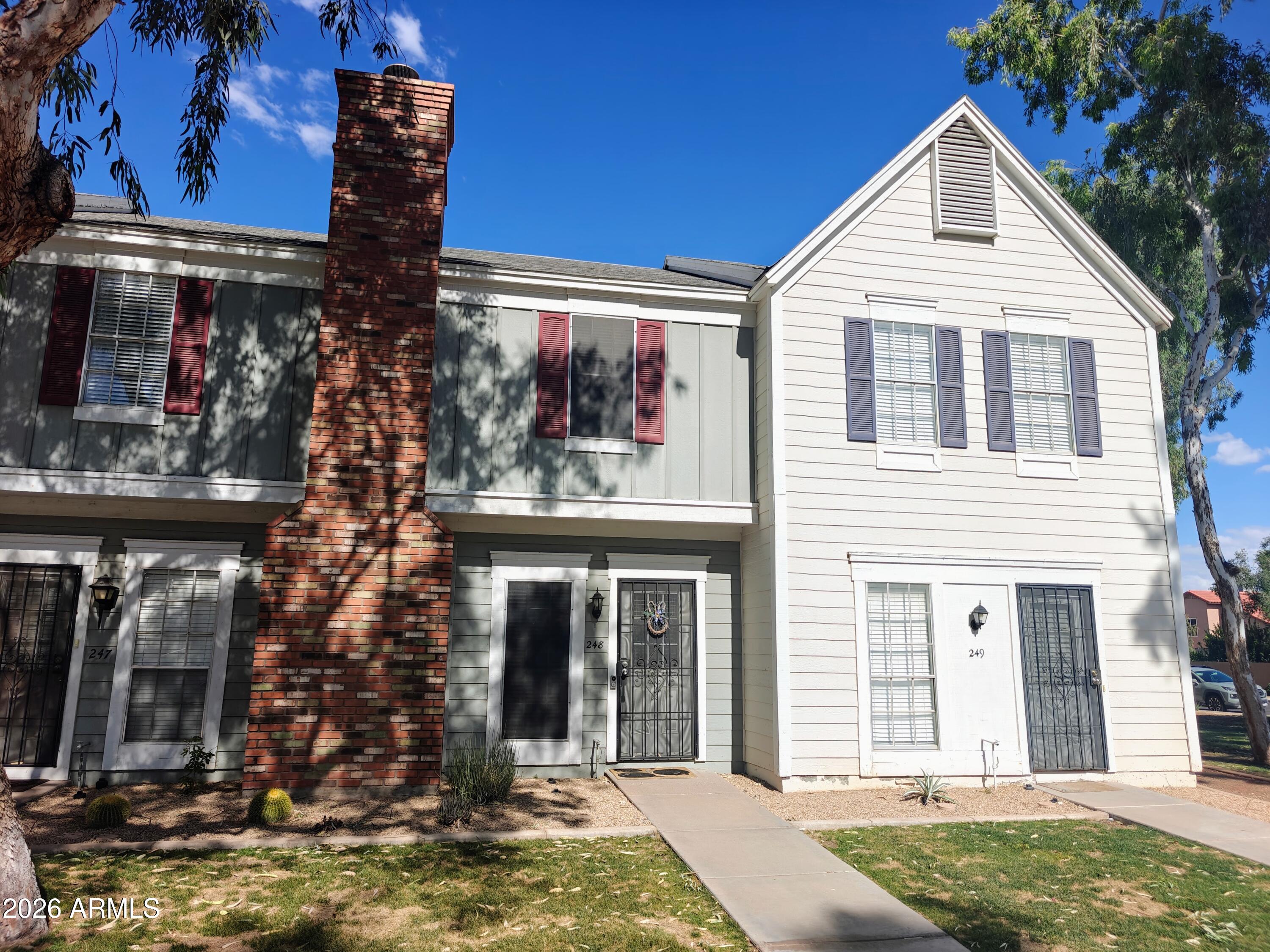 Nestled in the heart of Chandler, this charming townhome offers a cozy living room with a corner fireplace. The upgraded eat-in kitchen features an R/O system and a breakfast bar. Upstairs, the bathroom shower was remodeled in 2023, and luxury vinyl flooring has been installed. The AC, washer, dryer, and water heater are all newer models. The kitchen cabinets have also been resurfaced, and the unit is equipped with smart switches for added convenience. On a cool morning, enjoy the private courtyard or take a dip in the community pool on a hot summer day.