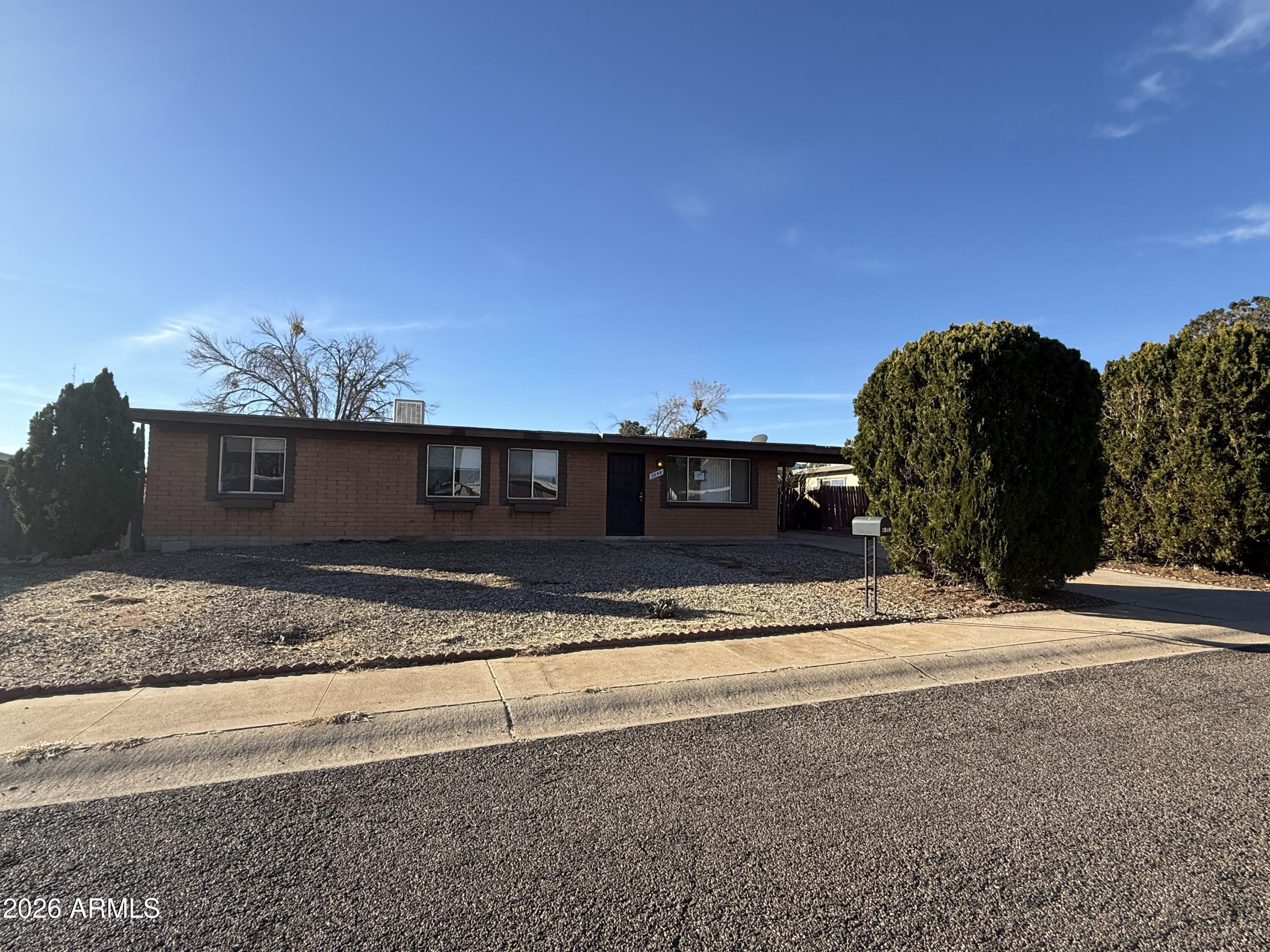This home has a ton of potential and it is a very well built slump block construction. There is a bright and sunny breakfast nook and the kitchen has a ton of natural light. There is a 1 car carport with room in the driveway for additional vehicles. There is also a shed and a large back yard. Best of all, Va Vendee financing may be available on this property. This financing is open to Veterans, Non Veterans, investors and owner occupants. This home will not last.