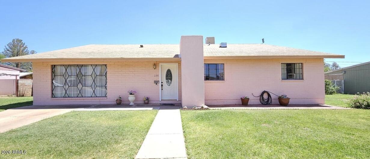 Meticulously maintained 4-bedroom, 1.75-bath home, it's move-in ready. Perfect for families & entertainers alike. Step inside to be greeted by elegant tile flooring throughout, leading you to a spacious formal living area featuring a cozy fireplace & a formal dining area. The well-appointed kitchen boasts ample cabinet space, making it an ideal space for gatherings. Just off the kitchen, a charming family room awaits, complete with its own fireplace, providing a warm & inviting atmosphere. The master suite offers a convenient vanity, a private shower & garden tub area. The exterior of the home is just as impressive, with beautifully manicured front & backyard spaces, blank canvas' awaiting your creations!