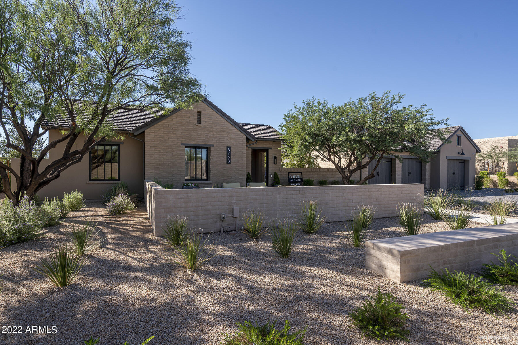 90 day  close!   Be in for winter season...
 Great opportunity to own the award winning Cheval model at Bronco! This one of a kind Urban Farmhouse design features 4 oversized bedrooms, bonus room, casita, and pool house. Stunning custom upgrades throughout include stained truss beams, built-ins, wall treatments and 2 way fireplace. The great room pocket doors invite you to enjoy the unbelievable indoor/outdoor living spaces. The oversized quartz bar with barbecue is shaded by a custom iron pergola. Enjoy sitting in your own private garden with herbs and vegetables under the outdoor decorative lights. This backyard entertainers dream has a resort like pool with baja shelf and separate hot tub. 2 outdoor fireplaces & fountains create the ideal spot to  bring your guests!  Award winning plan