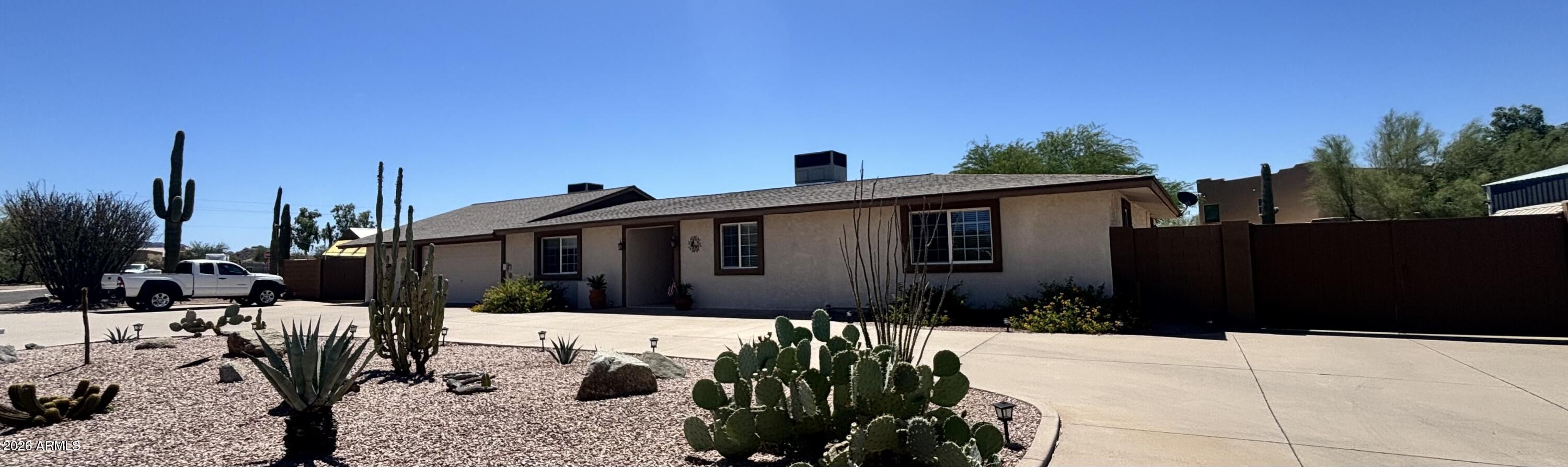 NICELY UPDATED and NO HOA so bring Your Toys! This incredible property offers everything you need for space, flexibility, and entertaining. Features include a large extended-length 3-car air-conditioned garage, paved circular driveway, RV parking with two RV gates, plus a separate electric panel for RV hookup. The spacious newly remodeled guest quarters includes a private entrance, full kitchen, and laundry, perfect for multigenerational living, guests or rental. Enjoy the beautiful backyard oasis with lush landscaping, covered patio, large newly updated diving/play pool with solar heating. Inside, you'll find a bright and updated open kitchen, updated tile flooring throughout, and beautifully remodeled bathrooms. The flexible floor plan features two dedicated office spaces ideal for working from home, a den, huge family room, spacious laundry room, abundant storage, and five additional storage sheds. Situated on a very private oversized lot with desirable north/south exposure. Major updates include full roof and HVAC replacements completed in 2022!