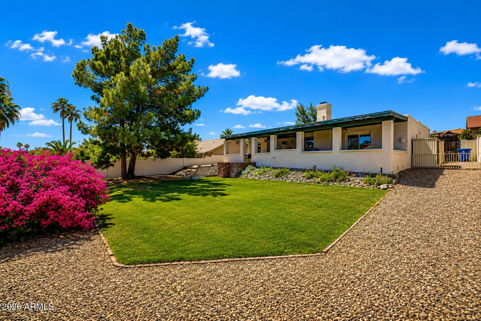 Beautifully updated home situated on an oversized lot with endless potential in desirable Fountain Hills. This property features approximately $58,500+ in upgrades and improvements, including updated flooring, remodeled primary bath vanity, recessed lighting, roof replastering, interior paint, ceiling enhancements, and an owned whole-house water softener and reverse osmosis system.

The redesigned windows-to-French-door conversion and new sliding door create an open feel with excellent indoor/outdoor flow to the large extended patio area. The expansive backyard offers room to add a pool and potential opportunities for future home expansion.

Additional highlights include professionally designed landscaping, side RV gate access, RV utility line installation, and space for a small RV or boat parking. Ceiling fans throughout provide added comfort and energy efficiency.

A rare opportunity to own a move-in ready Fountain Hills property with upgrades already completed and room to further customize and expand.