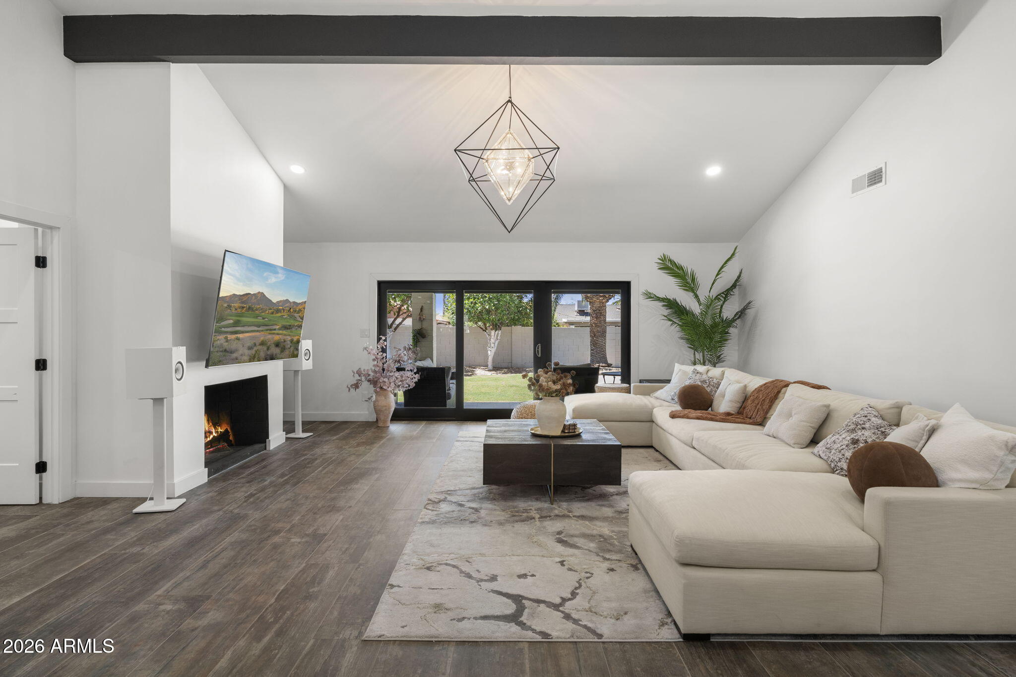 Discover Scottsdale's hidden gem community of Sands Scottsdale, offering a peaceful setting just minutes from the best shopping, dining, and entertainment. This beautifully updated 3 bedroom, 3 bath home features a light and bright open floor plan with vaulted ceilings, modern finishes, and tile flooring throughout. The stunning kitchen is equipped with granite countertops and stainless steel appliances. Each spacious bedroom includes its own private bathroom, offering comfort and privacy for family and guests. Step outside to your own private backyard retreat with fresh new sod, mature citrus trees, and a sparkling pool, perfect for relaxing and enjoying Arizona's beautiful weather. Combining timeless style, thoughtful updates, and an unbeatable location, this home truly has it all.