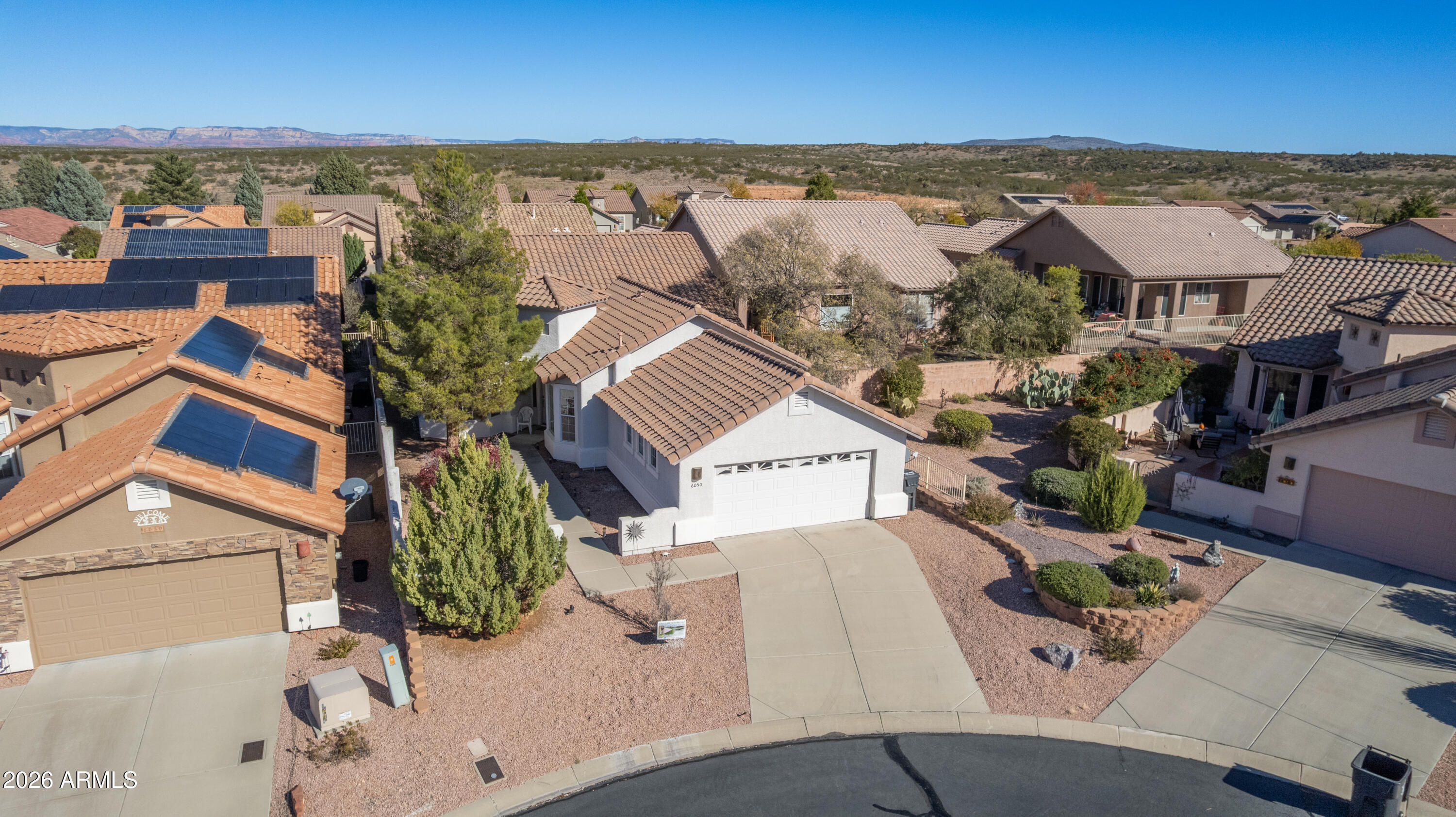 Fall in love with the lifestyle in this serene cul-de-sac setting in the gated community of Verde Santa Fe. Designed for relaxed, resort-style living, this sought-after neighborhood blends peaceful surroundings with an active, social lifestyle. At the center of the community is an impressive 4,900-square-foot clubhouse, thoughtfully appointed with a fitness center, full kitchen, billiard room, card and meeting rooms, and a spacious great room perfect for gatherings and events. Step outside to enjoy the beautifully maintained outdoor amenities, including a heated pool, soothing spa, and inviting BBQ patio, ideal for soaking up Arizona's sunshine and spending time with friends and neighbors. Come see what your next chapter can look like.