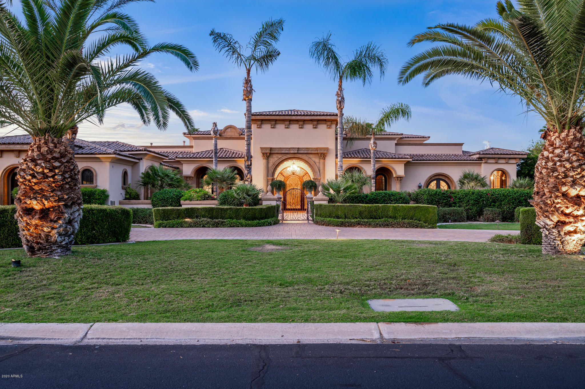 A true showstopper offering all of today's modern amenities, world-class finishes, unyielding privacy & prime orientation on an acre+ lot! Showcasing classical European architecture with Mediterranean flavor by Scott Alexander, this striking residence affords true luxurious living in the heart of Paradise Valley. Inside you will find: 5 beds, 8 baths, Game Floor with billiard room, bar & 12-seat home theater! The outstanding owner retreat features a sauna & gym room. Interiors flow elegantly with retractable doors lending you to a resort-grade backyard flanked with an extended length covered patio & abundant sitting areas, an incredible pool with water features, heated spa, & tremendous backdrop views of iconic Camelback Mountain! With over $7.4M invested, this is an opportunity to be had!