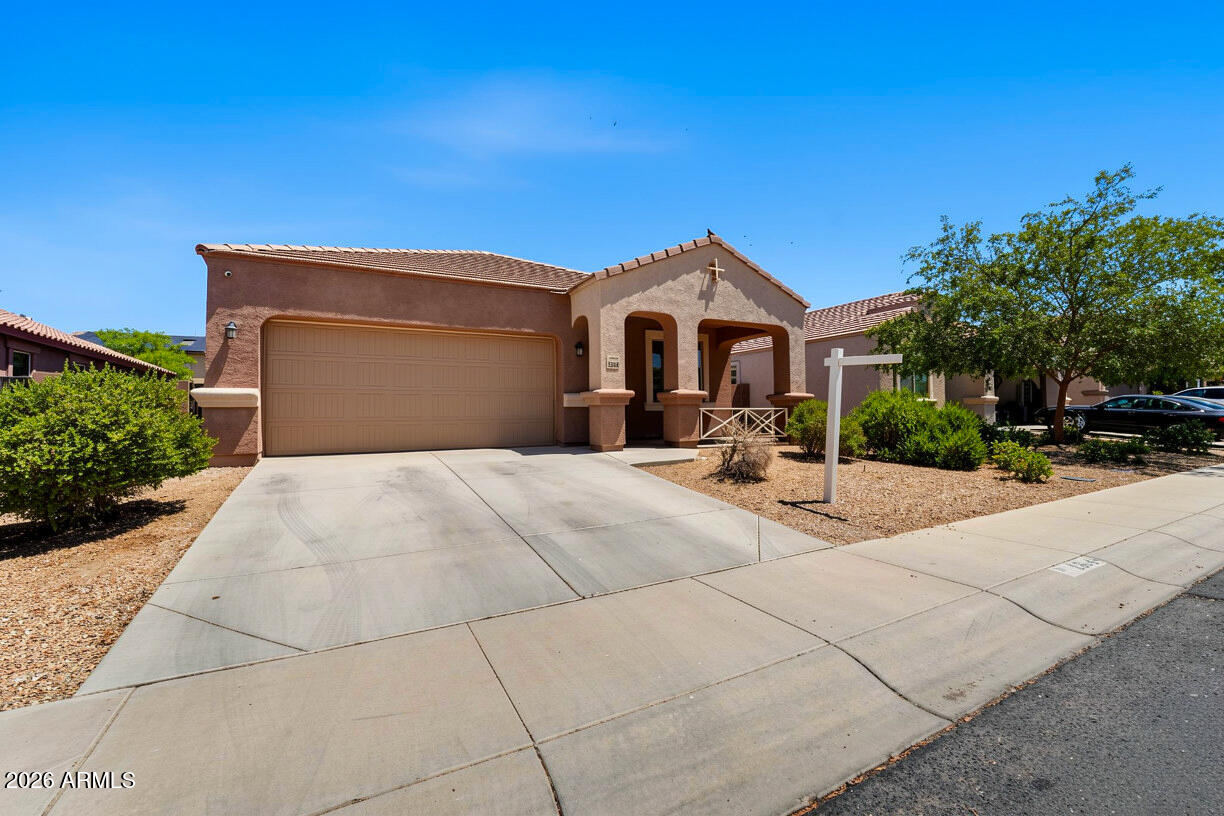 A single-level home in Sonoran Vista with the kind of layout buyers are usually trying to find in this price range: 4 bedrooms, a separate den, 2.5 bathrooms, and 1,855 sq ft of living space. The main living area brings the kitchen, dining, and great room together, while the den gives you a true flex space away from the bedrooms. The primary suite includes a walk-in closet, full bathroom, and private toilet room. The home also includes  solar, a covered patio, block-fenced backyard, desert front landscaping, and a 2-car garage. Conveniently located  with access to nearby schools, shopping, dining, and Buckeye's continued grow