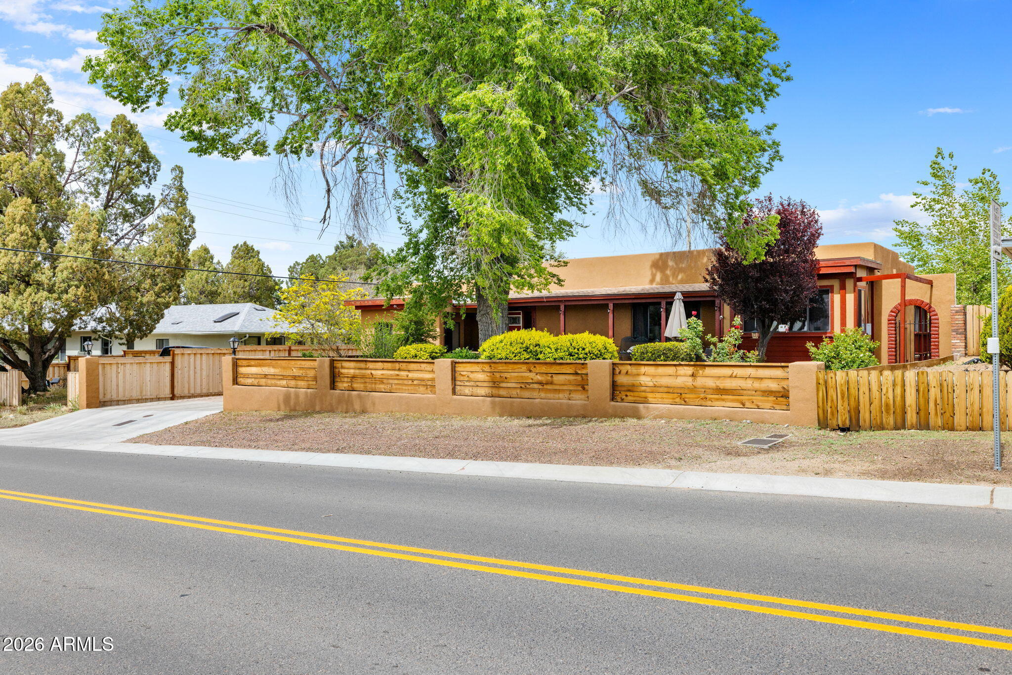 Charming Prescott property just minutes from downtown, offering rare flexibility and ample space! This home features updated interior finishes, including fresh paint, durable tile, vinyl, and warm hardwood flooring throughout. The spacious, private backyard is adorned with mature trees and full-perimeter privacy fencing, making it perfect for relaxing, entertaining, or accommodating pets. Alley access enhances functionality, providing dedicated RV parking and room for additional vehicles or recreational toys. A standout feature of this property is the multiple outbuildings, which include two 12x12 sheds and a 15x15 shed--ideal for storage, workshop space, or hobby use. Whether you're seeking a full-time residence, a second home, or an investment opportunity, this property offers versatility, privacy, and a prime location close to everything Prescott has to offer.