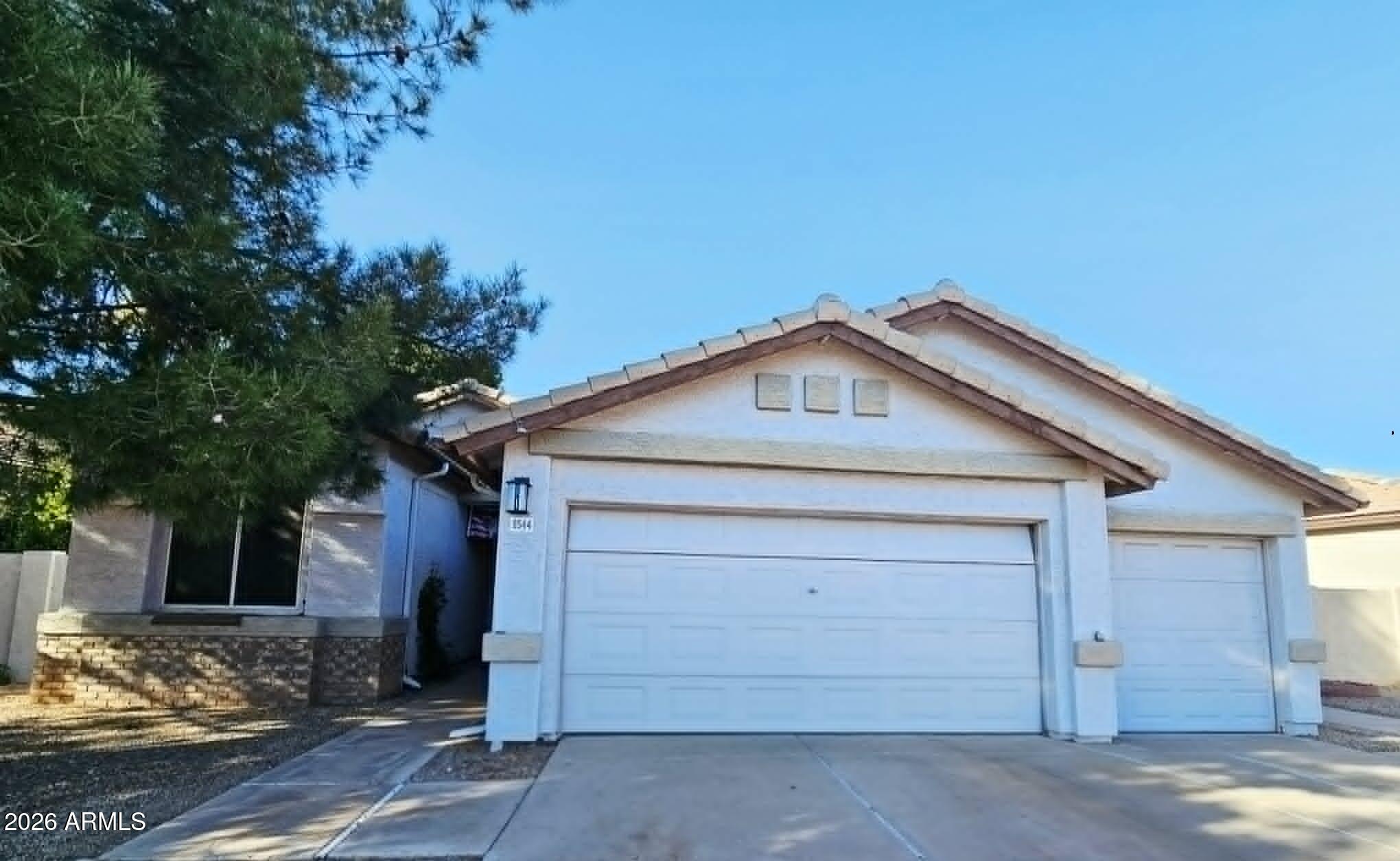 Welcome to this beautifully maintained 3-bedroom, 2-bath home situated on a premium golf course lot in the highly sought-after Greenfield Lakes community, just steps from Agritopia, walking distance from a huge dog park and some of Gilbert's finest dining, shopping, and entertainment. This warm and inviting home located on the 8th T-box, features gorgeous granite countertops throughout, stylish laminate plank flooring, and abundant natural light that fills every room. The open and comfortable floor plan creates the perfect atmosphere for both everyday living and entertaining. Step outside to your private backyard oasis where lush green grass, mature shade trees, and a covered patio provide the ideal setting to relax and enjoy breathtaking golf course views. Whether you're sipping your morning coffee or unwinding at sunset, the tranquil scenery is sure to impress. Located in one of Gilbert's most desirable neighborhoods, residents enjoy access to the award-winning Greenfield Lakes Golf Course, scenic walking paths, parks, and top-rated schools. This rare golf course property offers the perfect blend of comfort, beauty, and location. Don't miss your opportunity to own a piece of paradise in the heart of Gilbert!
