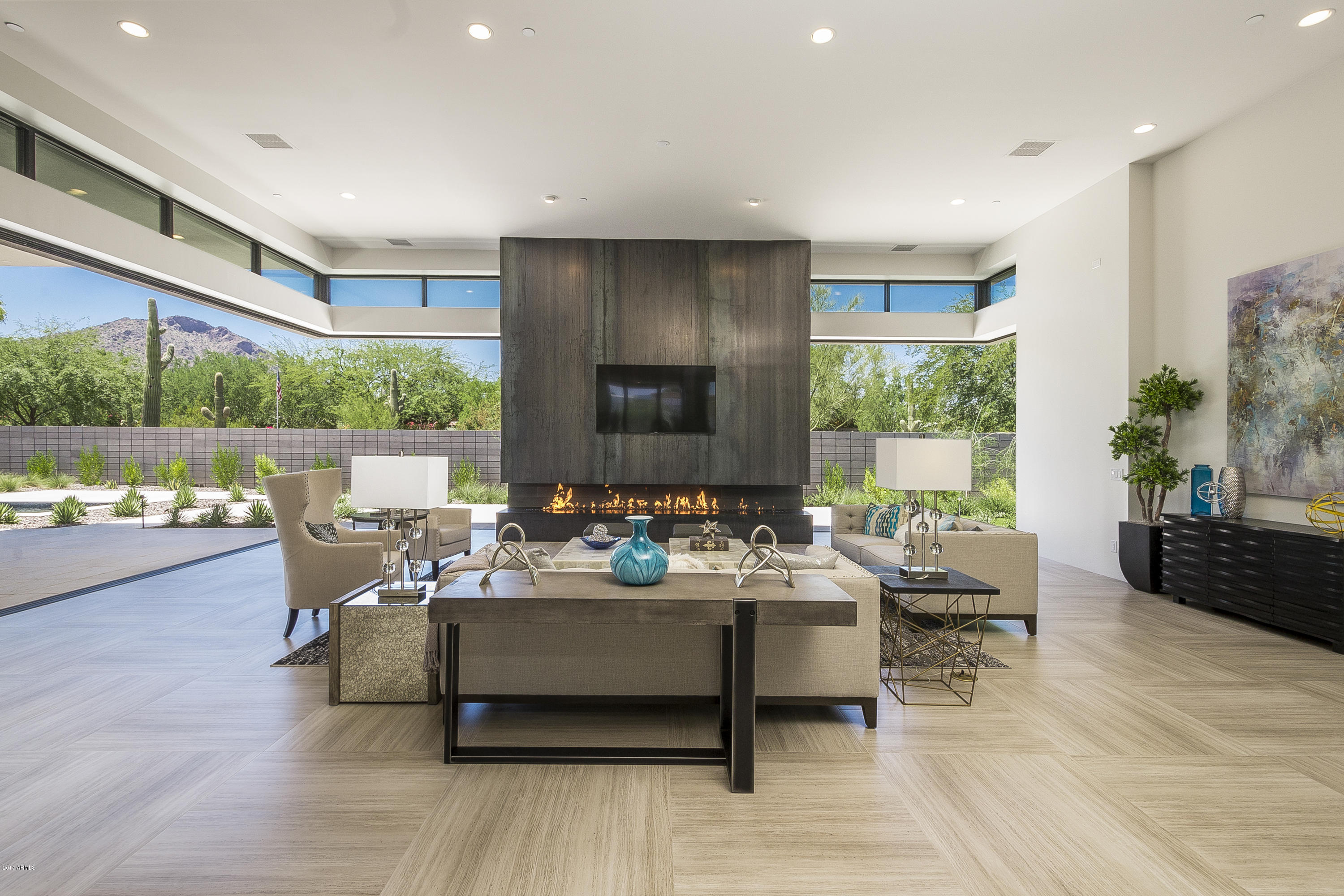 STILL LISTED & AVAILABLE...TO BE COMPLETED MARCH 2018...KACHINA ESTATES welcomes you to live in the newest subdivision of Paradise Valley boasting the highest level of modern, contemporary elegance with state of the art finishes. This is the address of Luxury. This home will host a large master suite with 3 additional bedrooms, each with their own bath. A dining room with wine storage and butler's pantry allows for endless entertaining opportunities. The chef’s kitchen and great room will overlook a covered outdoor living area through expansive, retractable glass doors leading to your pool and private spa. Exercise/flex space plus an office/playroom allow fun for all! All of this on a sprawling one acre lot with a spacious 4 car garage. Disclaimer: Photos from different property.