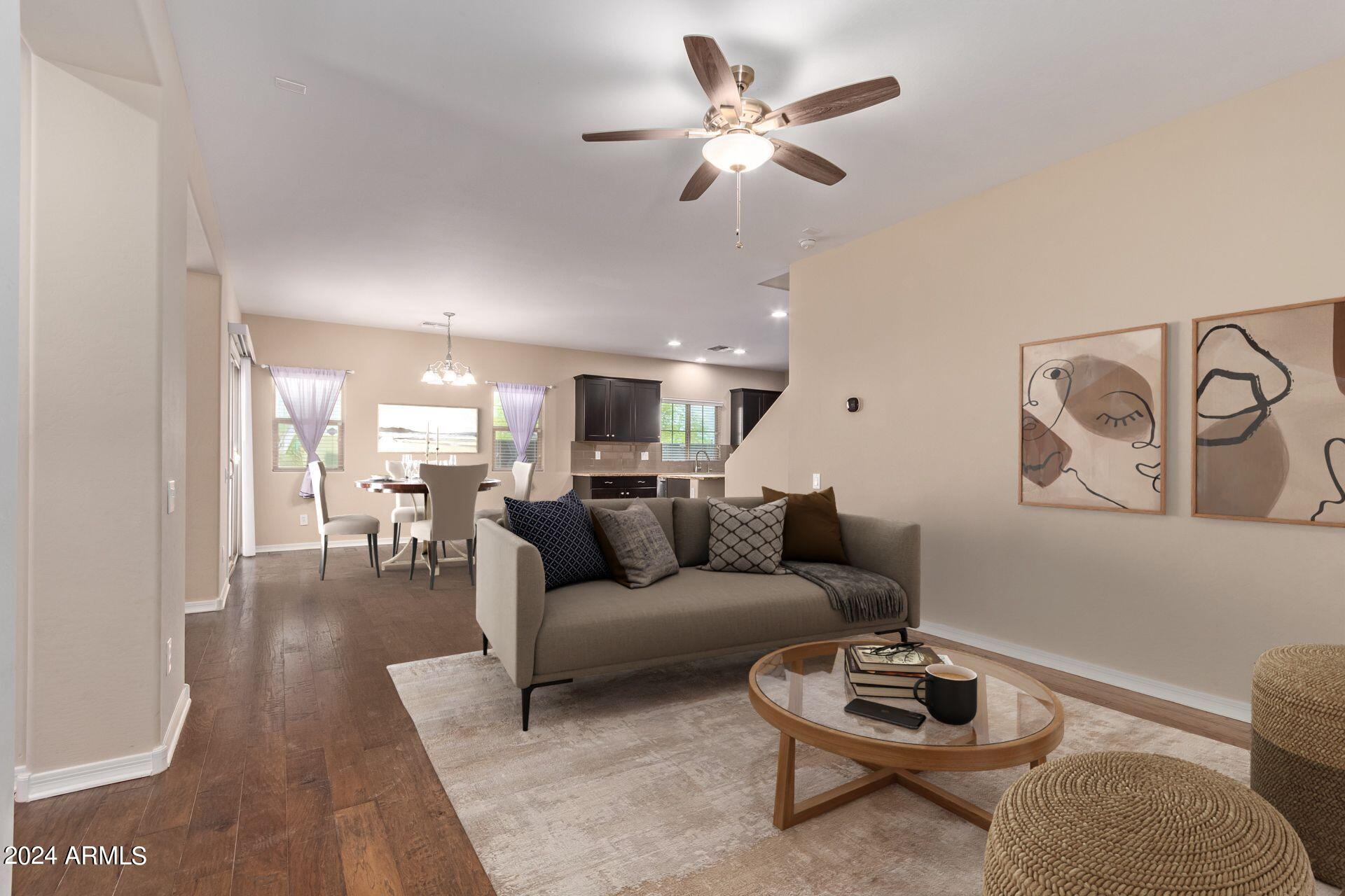 Experience the perfect blend of luxury, convenience, and modern efficiency in this meticulously upgraded residence in the heart of Fireside at Desert Ridge. From the moment you step inside, you'll notice the premium finishes throughout, including upgraded flooring and a gourmet kitchen designed for the home chef. The kitchen features custom cabinets with convenient slide-out shelving, a stunning glass tile backsplash, high-end stainless steel appliances, and a large center island perfect for hosting.Designed for seamless daily living, this home offers a spacious walk-in pantry, a dedicated laundry room with a custom-built drop zone/mudroom, and a split-garage layout with integrated professional-grade storage. You'll enjoy peace of mind and convenience equipped with Ecobee Smart Thermostats, and smart garage openers.

Located in a premier community, you are minutes away from  shopping and dining at Desert Ridge Marketplace and High Street, major freeways, and the Mayo Clinic. Families will appreciate the proximity to top-rated schools.  

As a resident, you gain exclusive access to the Fireside Clubhouse, featuring resort-style amenities: sparkling pools, a splash pad,  spa,  gym with fitness classes, tennis courts, and a vibrant calendar of community events. This is more than just a home--it's a lifestyle.