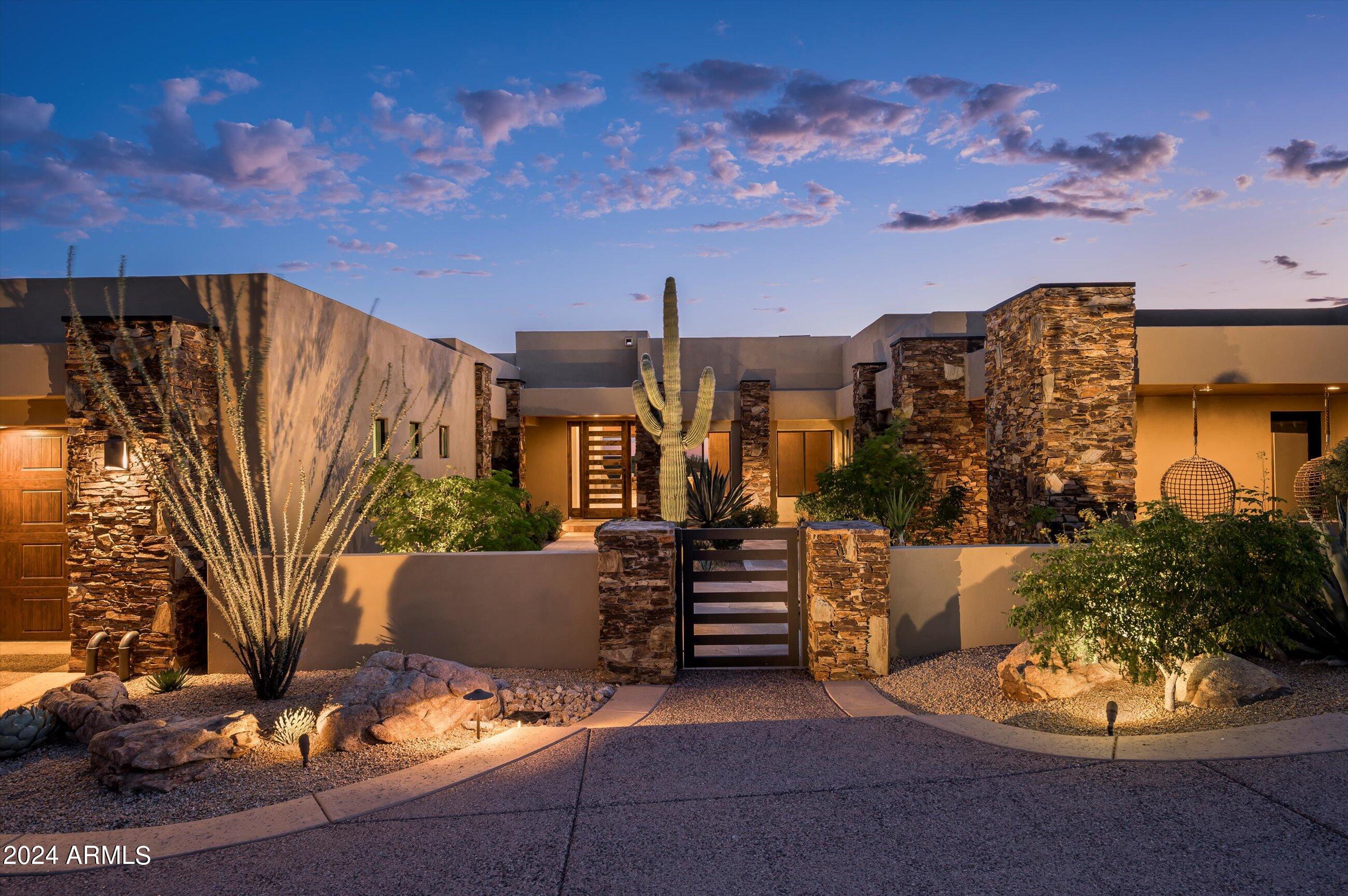 Desert Mountain Golf membership available. Wonderful Desert Contemporary home in the centrally located village of Mountain Skyline at Desert Mountain.  The functional Great Room floor plan has four en-suites, powder room, bonus room/study and a 3 car garage. NO steps in the entire home.  The outdoor living area offers an outdoor kitchen, pool, spa, fire pit, shower and ample covered patio space. The orientation
is south to southwest which offers great views of classic Arizona sunsets, mountains and lush desert vegetation. The home features a Savant Home automation system and solar.
