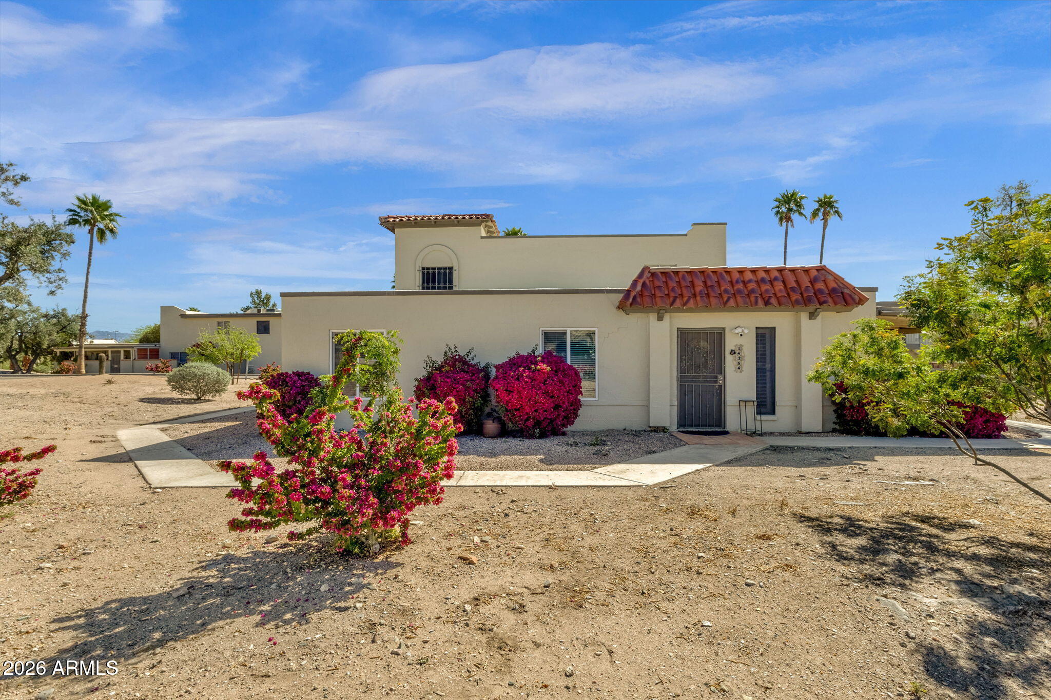 Southwest Charm with Extensive Upgrades in Fontana
This 3-bedroom, 2-bath home offers 1,066 square feet of thoughtfully updated living space in the desirable Fontana community. Combining classic Southwestern charm with extensive recent updates, this home delivers both style and confidence in its quality.
The interior has been refreshed with new paint throughout, complemented by professionally applied grass cloth accent walls that add warmth and texture. The open living and dining areas feature tile flooring, abundant natural light, and a seamless flow into the kitchen, equipped with a new refrigerator and dishwasher. Both bathrooms have been fully remodeled with new tile tub and shower surrounds, updated vanities, new toilets, modern lighting, new mirrors, and all-new plumbing fixtures, creating a clean, updated feel.
Additional improvements extend throughout the home, with all new doors and hardware, a new sliding patio door, new closet doors in two bedrooms, and mirrored closet doors in the primary suite. All bedrooms feature new windows, along with new window blinds and updated blinds on the patio door. Furnishings include two new beds with frames, headboards, and mattresses, along with matching nightstands in both the primary and guest bedrooms.
Outdoor living is equally appealing, with a private patio ideal for enjoying Arizona's weather, low-maintenance desert landscaping, and a covered 1-car carport. A Ring doorbell system and exterior motion lighting add an extra layer of convenience and security.
Located within the Fontana community, residents enjoy access to a community pool and on-site laundry facilities, all just minutes from restaurants, shopping, schools, parks, and the iconic Fountain Hills fountain.
It's a move-in ready opportunity with meaningful upgrades already completed, offering style, functionality, and value in a prime location.