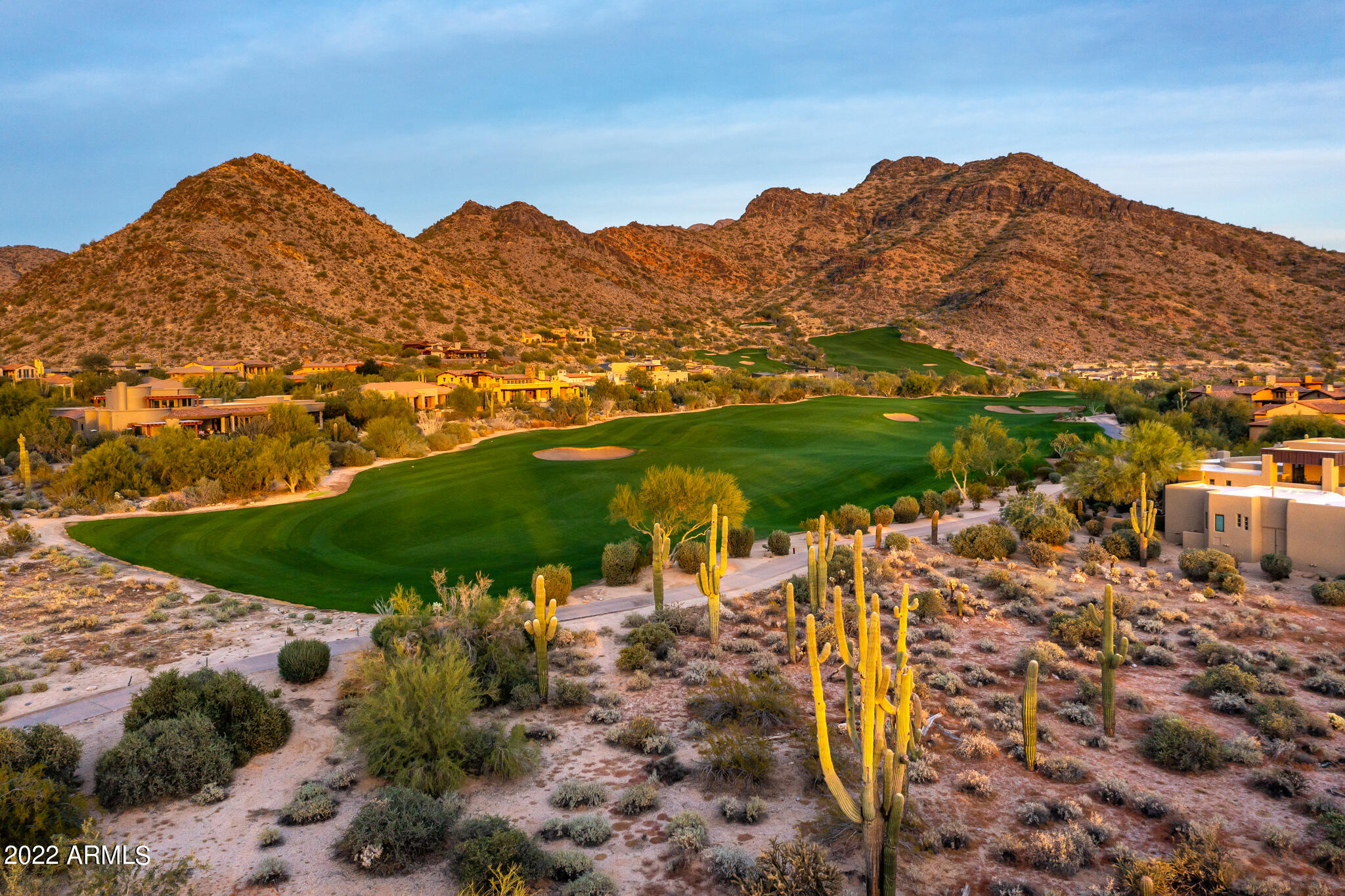A rare find in Country Club at DC Ranch, one of the last custom lots remaining in this prestigious community. Backing to the 11th fairway, this 0.80 acre home site picks up not only lush golf views, but dramatic mountain vistas. An added bonus are the beautiful fairways, stunning sunsets and city lights. Purchase includes plans for a 7,848 sq. ft. to be built contemporary home, fully approved by DC Ranch Covenant Commission and the city, ready to begin construction. Renderings and floorplan in Documents Tab. DC Ranch in North Scottsdale, Arizona, is a luxurious community seamlessly blending upscale living with natural beauty. Known for its high-end homes, well-designed neighborhoods, and stunning desert landscapes, DC Ranch offers a lifestyle that combines modern amenities with a connection to the Sonoran Desert. With charming marketplaces, like the popular Market Street, fine dining, and community events, DC Ranch creates a close-knit atmosphere where residents enjoy the tranquility of the desert alongside vibrant community life. The architectural style, influenced by Western and Mediterranean elements, adds to the area's distinctive character, making DC Ranch a sought-after destination for those seeking upscale living in North Scottsdale.