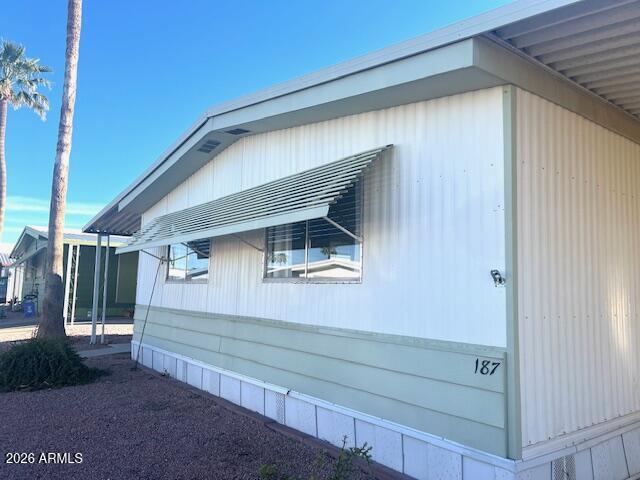 REDUCED! Welcome home to this neat, clean, newly updated affordable home. It's located in a gated 55+ active adult community with low lot rent, Mountain views and a very large backyard. lSome of the NEW items include a 3 door refrigerator, new flooring  & ceiling fans.  Your kitchen also has a farm sink, plenaty of cabinets with new handles and drawer pulls and a coat or broom closet.  Both bathrooms have been updated with vanities, dual flush toilets. There is a walk in shower in the primary Bathroom. The washer and dryer stay as well. The shed with double doors has ample room for garden tools and storage . There's so many activities to enjoy at the clubhouse and pool plus pickleball courts & workout room.  Come and make this your new home. Home Warranty is included!