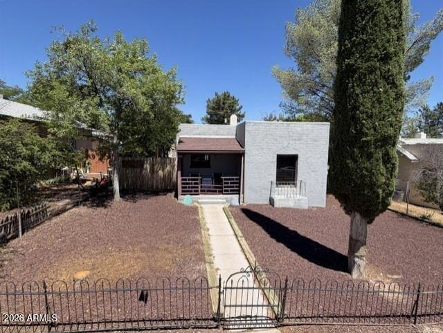 Beautiful historic home in Upper Clarkdale. This 2-bedroom 1 bathroom bungalow boasts historic Clarkdale charm with modern updates including an open floor plan from the kitchen to living room, updated flooring, countertops and large breakfast bar. The home also features newer windows in most rooms and an updated bathroom. Primary bedroom features a walk-in closet, while the laundry room offers plenty of storage and a large utility sink. Landscaping is adorable and backyard features a 1 car carport + plenty of additional parking. The 12x20 shed includes a ceiling fan and 120v electricity. In addition, there is RV parking in back too. Come experience what life used to like by sitting on the front porch sipping coffee and waiving to neighbors walking by !