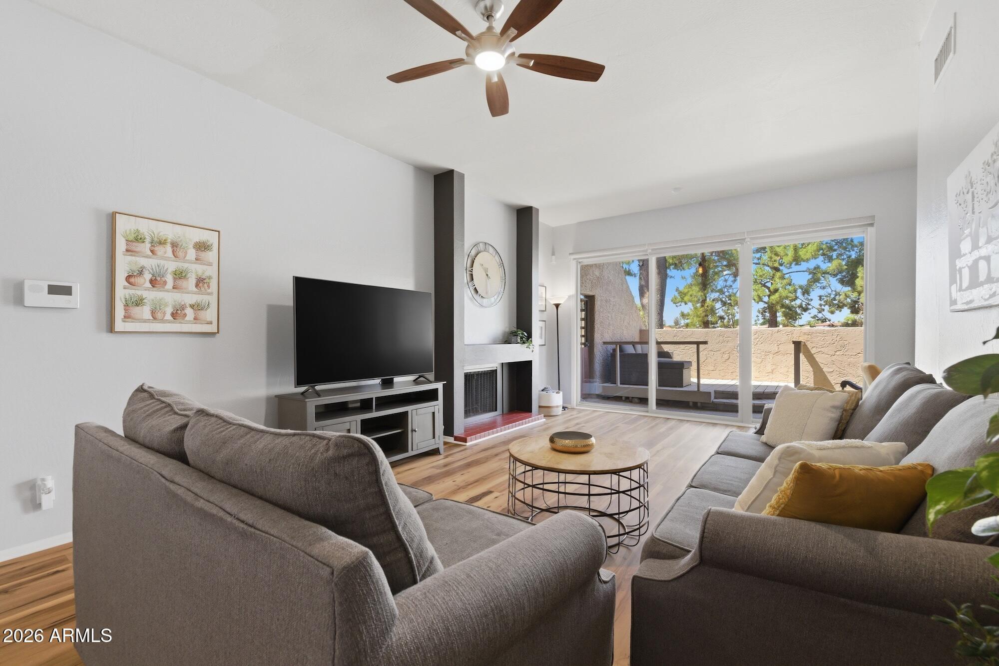 AC, NEW (2026). NUFLOW PLUMBING, NEW (2025). ELECTRICAL PANEL, NEW (2023). WATER SOFTENER, NEW (2023). The big-ticket items have already been taken care of, offering a rare combination of style, comfort, and true peace of mind.

Step inside to soaring ceilings, beautiful natural light, and a spacious open layout that feels both inviting and functional. The living area is centered around a sleek modern fireplace and flows seamlessly to the dining space and private patio, where you can enjoy views of the water right from home. Updated flooring installed in 2024 and kitchen countertops completed in 2023 add a fresh, modern feel throughout.

Beautifully maintained and truly turn-key, this home offers the kind of low-maintenance living that's hard to find. Whether you're looking for a primary residence, lock-and-leave convenience, or simply a home where the major updates are already done for you -- this one is absolutely worth seeing in person.