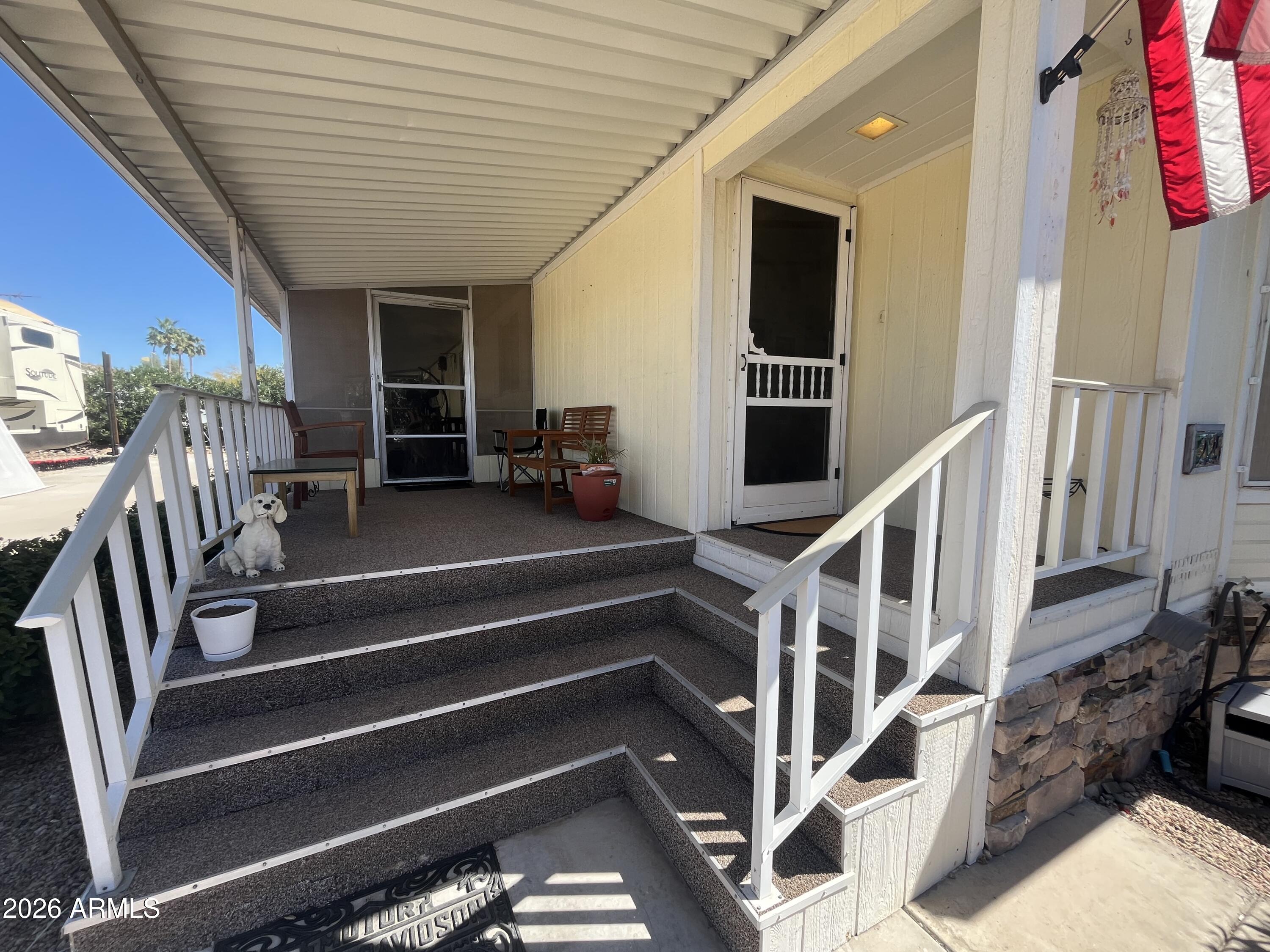 This BEAUTIFUL! VERY SPACIOUS! 2 bed 2 bath home has everything you are looking for: Tastefully upgraded with plantation blinds, artificial grass in back yard, refurbished A/C unit, newer roof, and MUCH MORE! 
Located in the Gated 55+ Community of Casa Del Sol East, enjoy a vibrant community with a recreation center, planned activities, a sparkling pool, work out facility and beautifully maintained grounds. Close to shopping, dining, and more!!