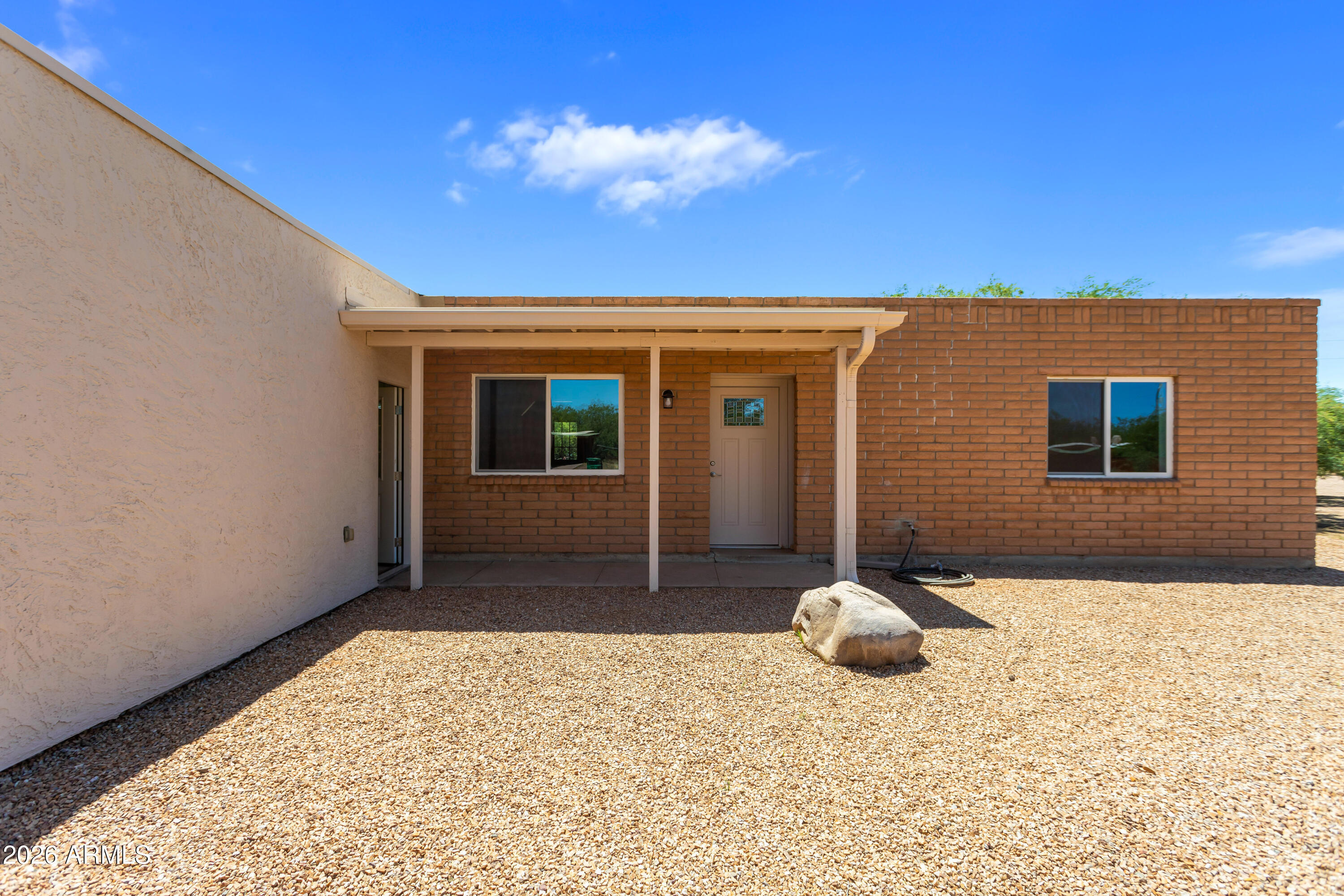 This newly remodeled 3-bedroom, 2-bath home with dedicated office space offers the perfect blend of quiet rural living and modern comfort. Interior upgrades include luxury vinyl plank flooring, custom hickory cabinetry, and A/C throughout. Situated on a spacious lot, the property also features an extended-length garage with plenty of room for vehicles, storage, or a workshop. This home is located just 20 minutes away from Sierra Vista or Benson. Owner/Agent. Buyer to verify sq ft.