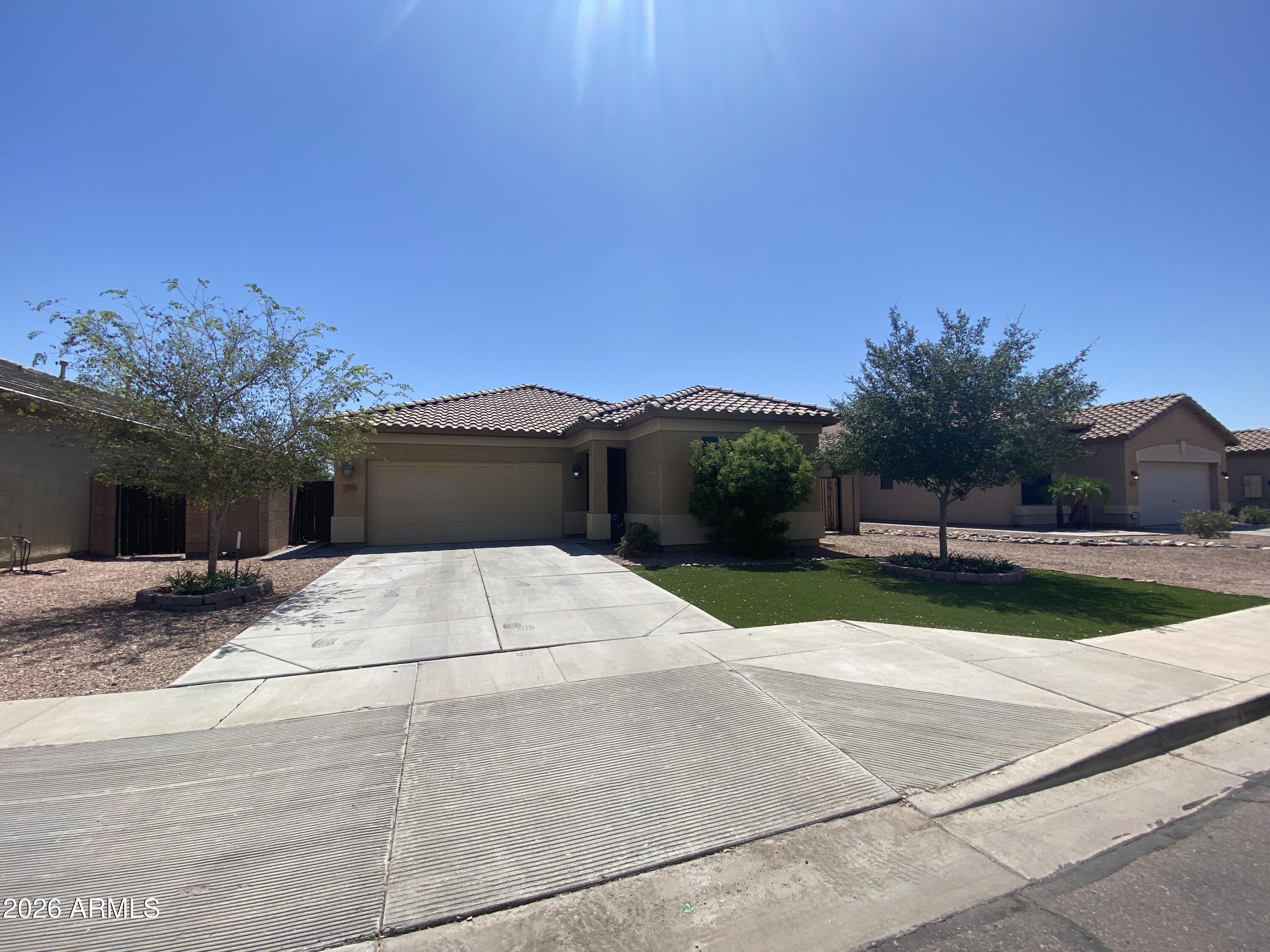 Welcome to this beautifully maintained home located in the desirable Laveen Meadows community! This spacious 3-bedroom, 2-bath home offers an open and inviting floor plan with stylish finishes throughout. The kitchen features stainless steel appliances, ample cabinetry, and plenty of counter space, perfect for everyday living and entertaining. Step outside to enjoy the beautifully landscaped backyard complete with a sparkling private pool -- ideal for relaxing with family and friends. Pool service and landscaping is included in the lease for added convenience and easy maintenance.