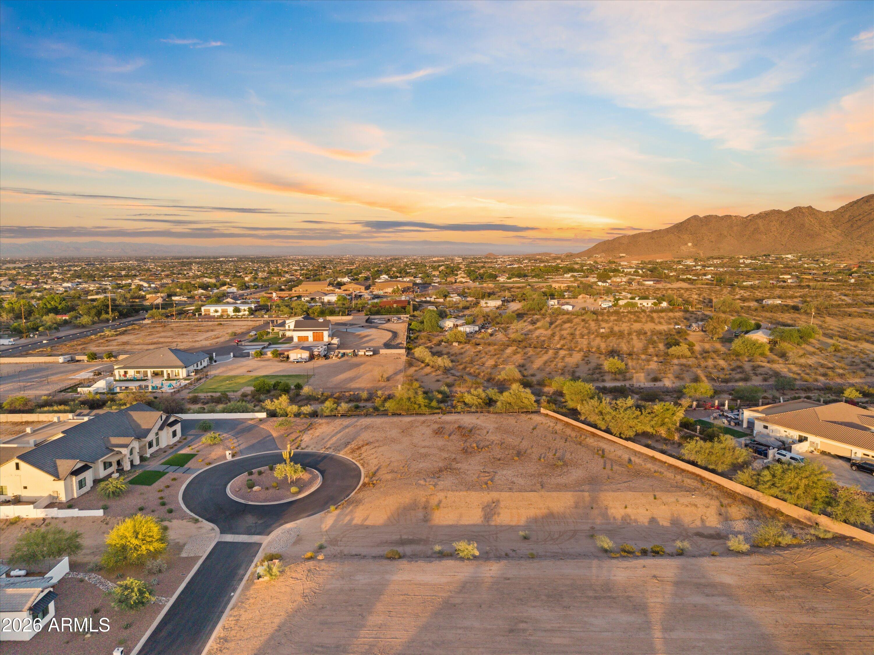 Santo Vallarta presents a rare chance to build your dream home within an exclusive gated community of custom luxury estates. Situated on a pristine 0.83-acre cul-de-sac lot, this homesite offers ideal north/south exposure along with breathtaking 180-degree desert and San Tan Mountain views, showcasing stunning sunrises and sunsets across the surrounding landscape. Tucked along the quiet east side of the community, the property provides a spacious and semi-private setting with expansive views stretching from east to west.

This lot is fully build-ready and includes soil testing, grading and drainage plans, and approved septic permits--allowing for a smoother building process and faster construction timeline. An exceptional opportunity to secure a premium homesite in one of the area's mos sought-after luxury communities. Buyer to verify all facts and figures.